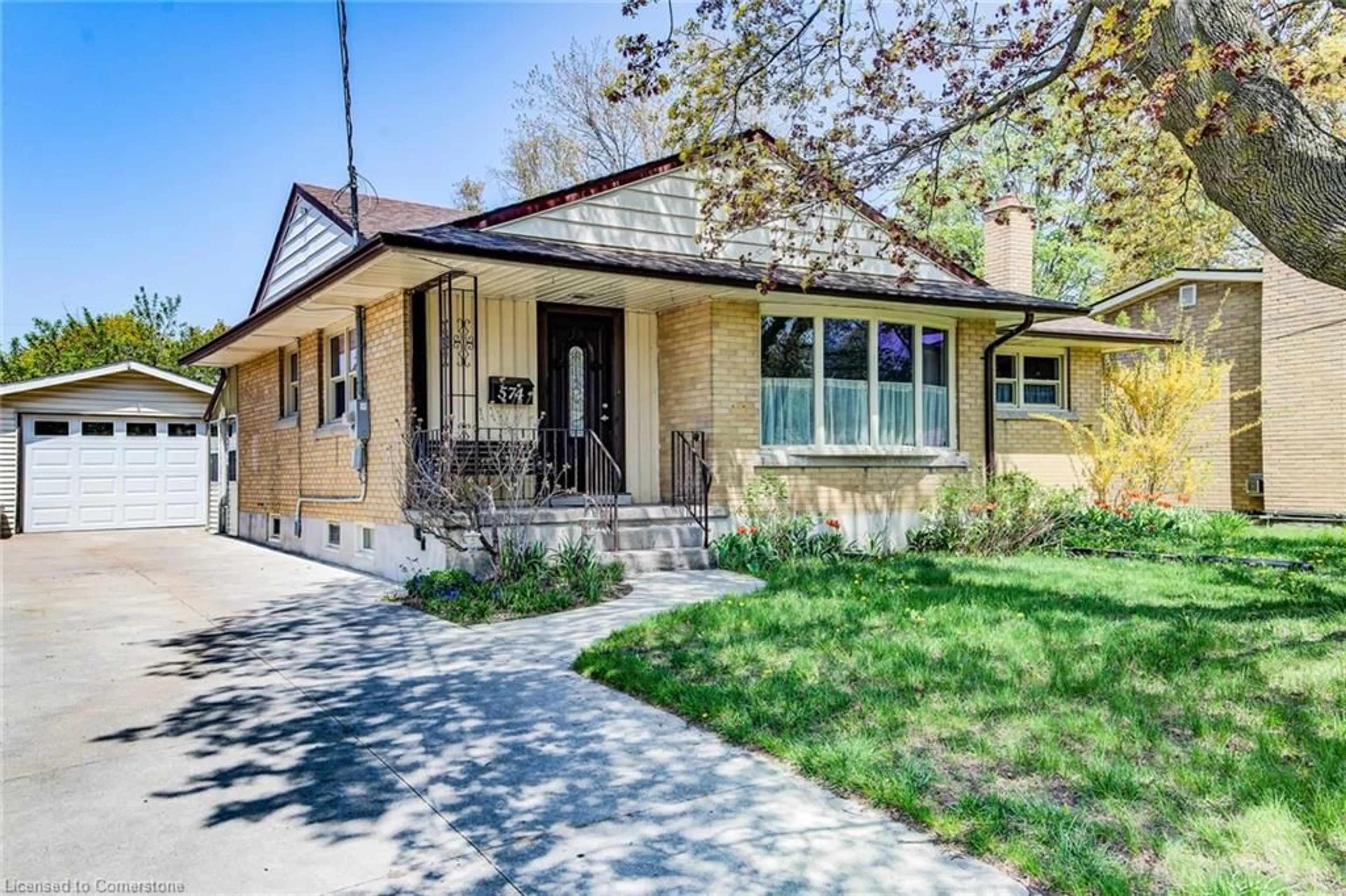 Home with brick exterior material, street for 574 Krug St, Kitchener Ontario N2B 1L7