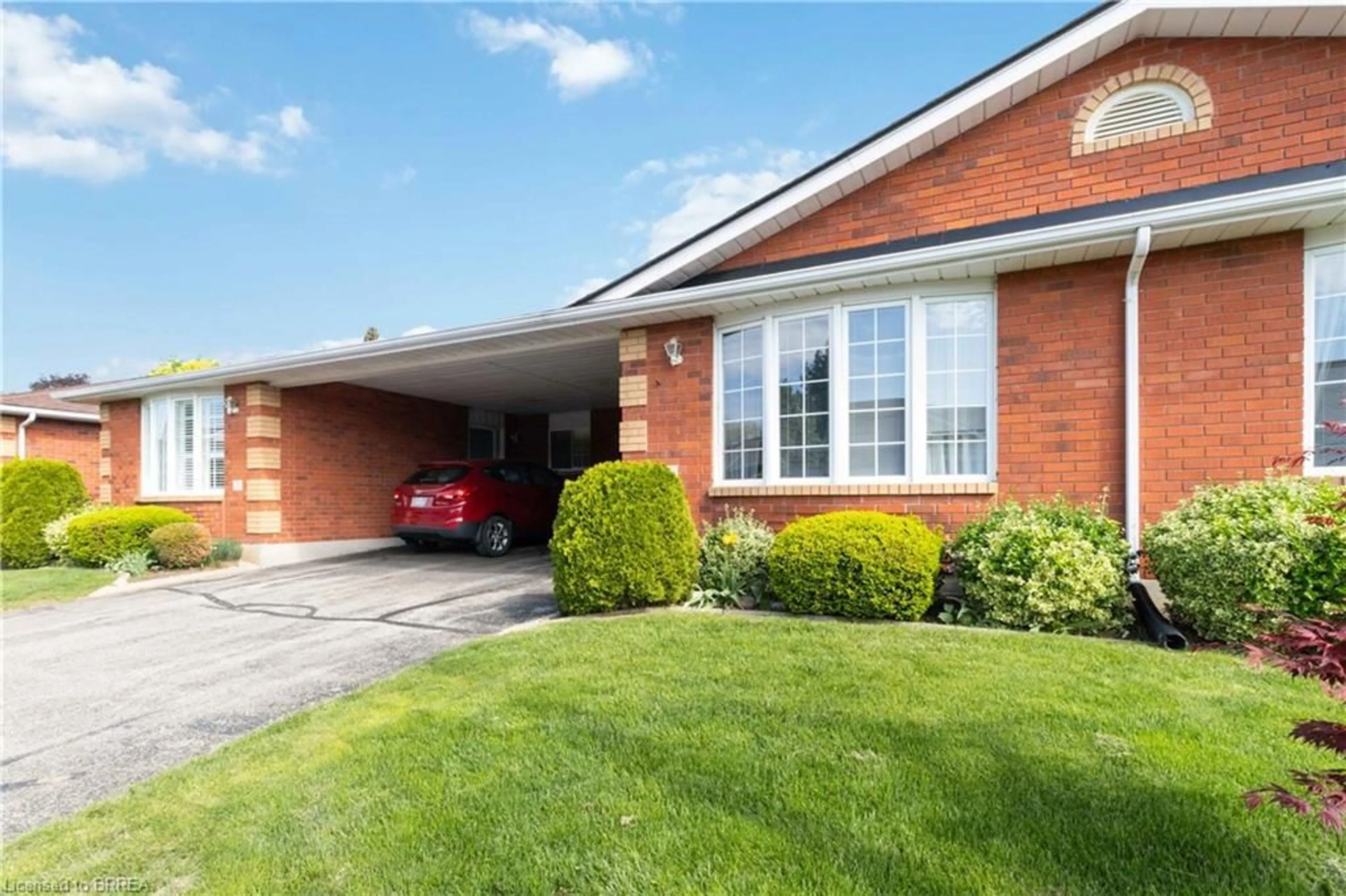 Home with brick exterior material, street for 20 Courtland Dr #8, Brantford Ontario N3R 7Y2