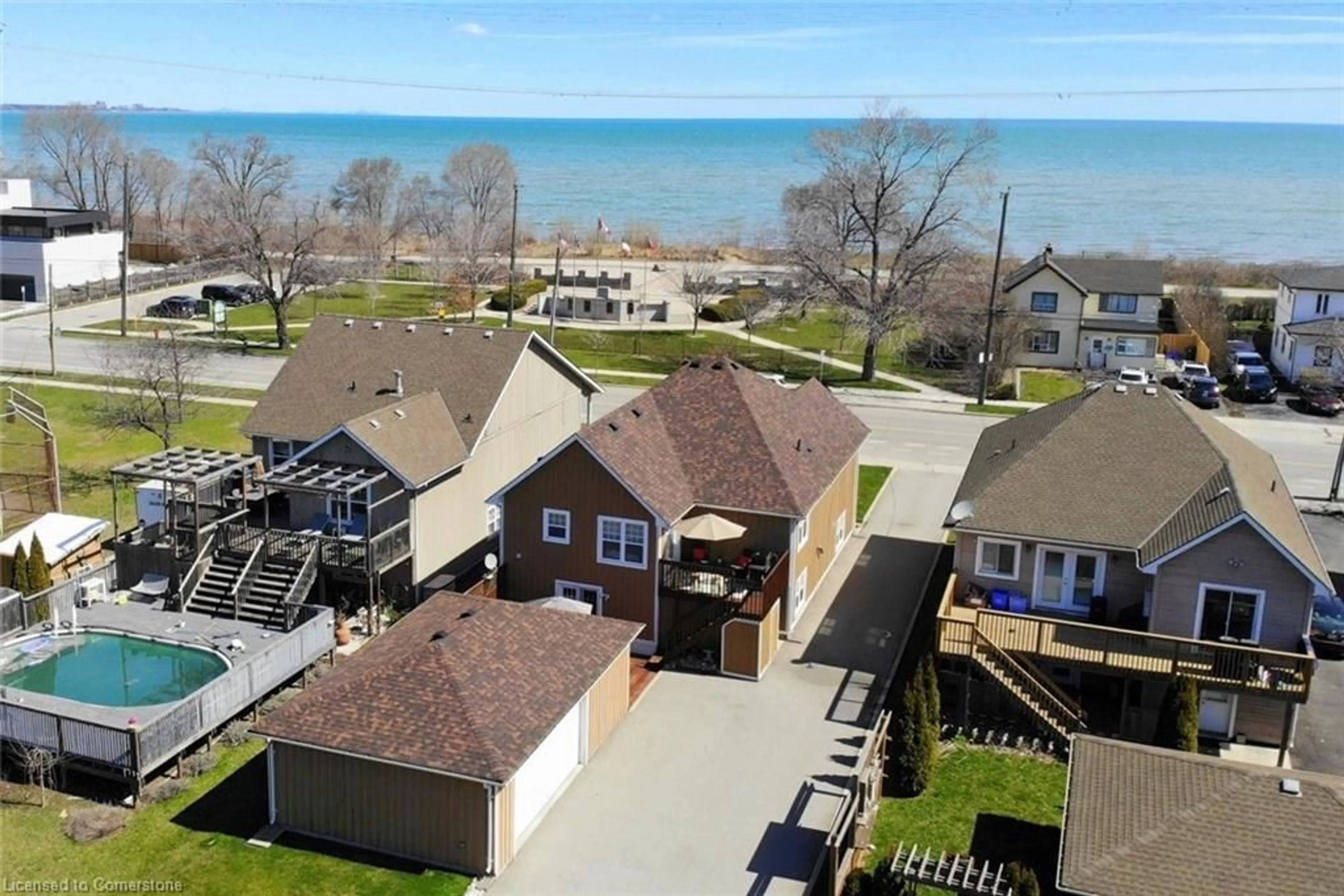 A pic from outside/outdoor area/front of a property/back of a property/a pic from drone, water/lake/river/ocean view for 1060 Beach Blvd, Hamilton Ontario L8H 6Z4