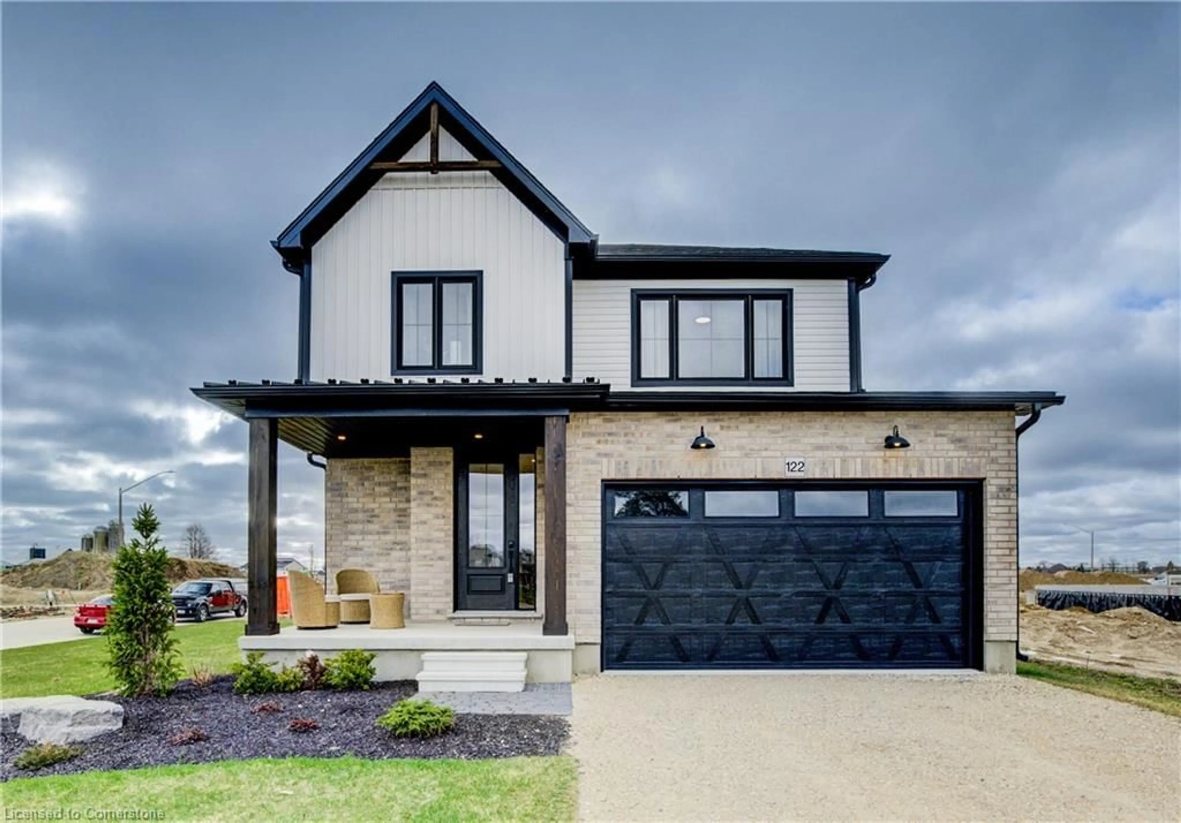 Home with brick exterior material, street for 109 Thackeray Way, Harriston Ontario N0G 1Z0