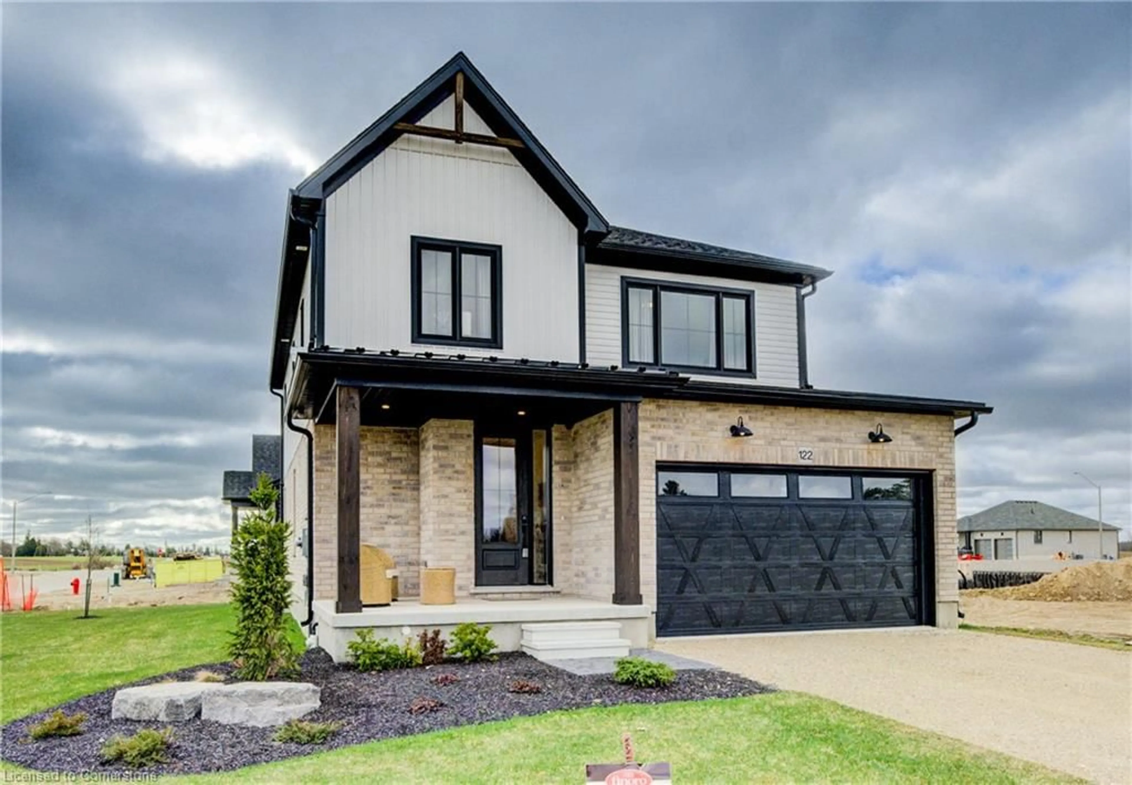 Home with brick exterior material, street for 109 Thackeray Way, Harriston Ontario N0G 1Z0