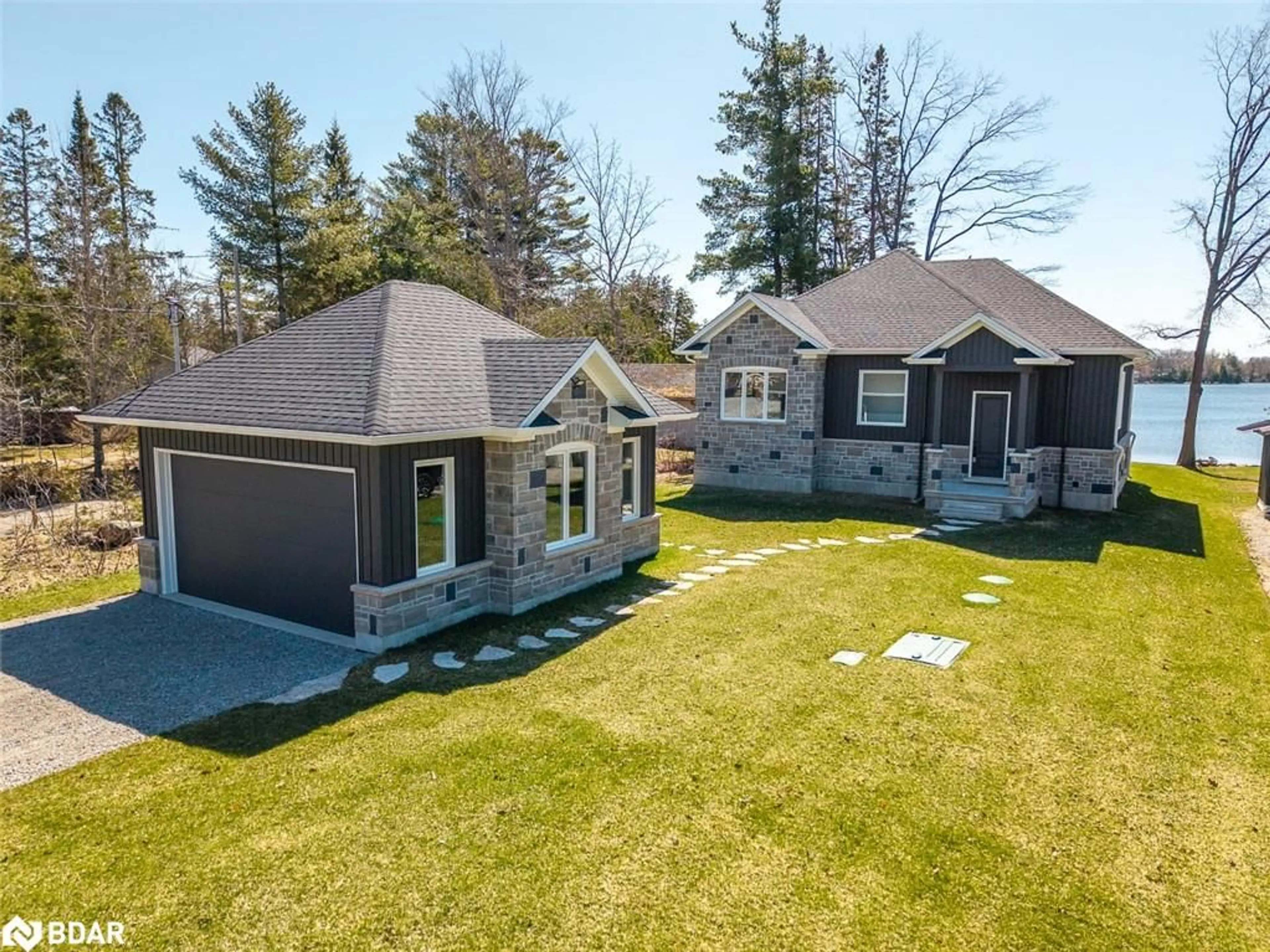 A pic from outside/outdoor area/front of a property/back of a property/a pic from drone, street for 3331 St George Blvd, Severn Ontario L0K 2B0