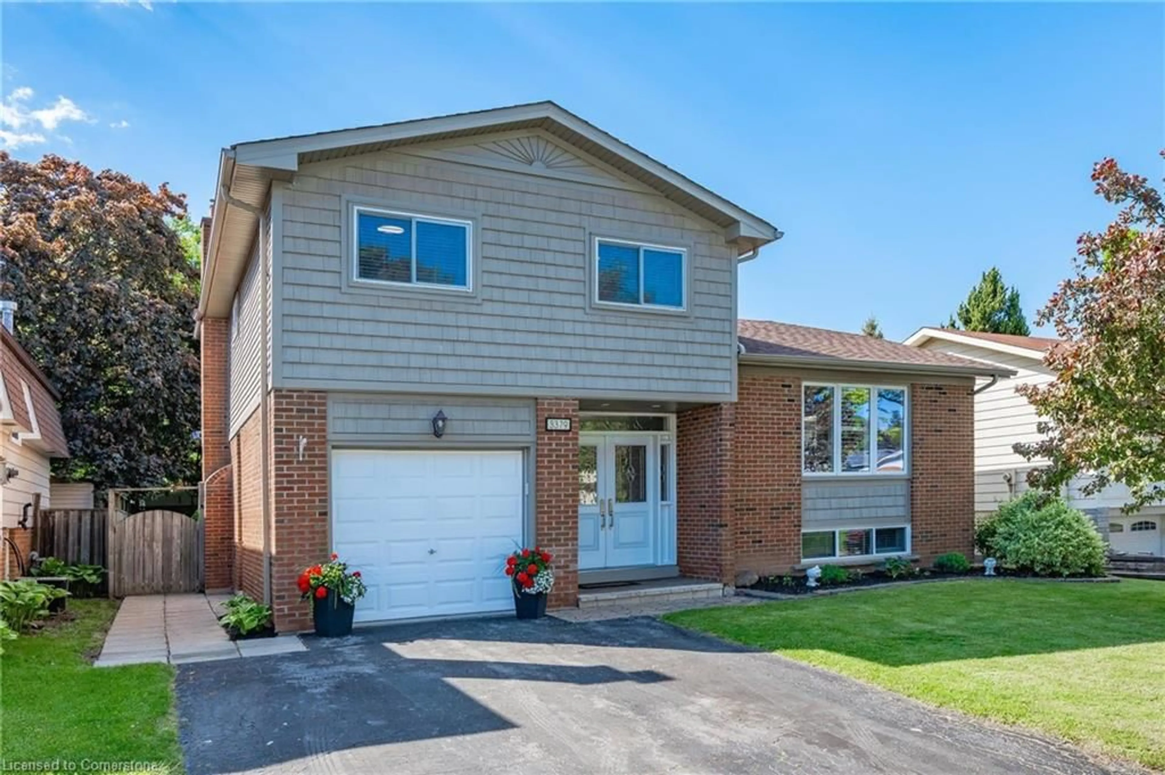 Home with brick exterior material, street for 3379 Lansdown Dr, Burlington Ontario L7M 1S5