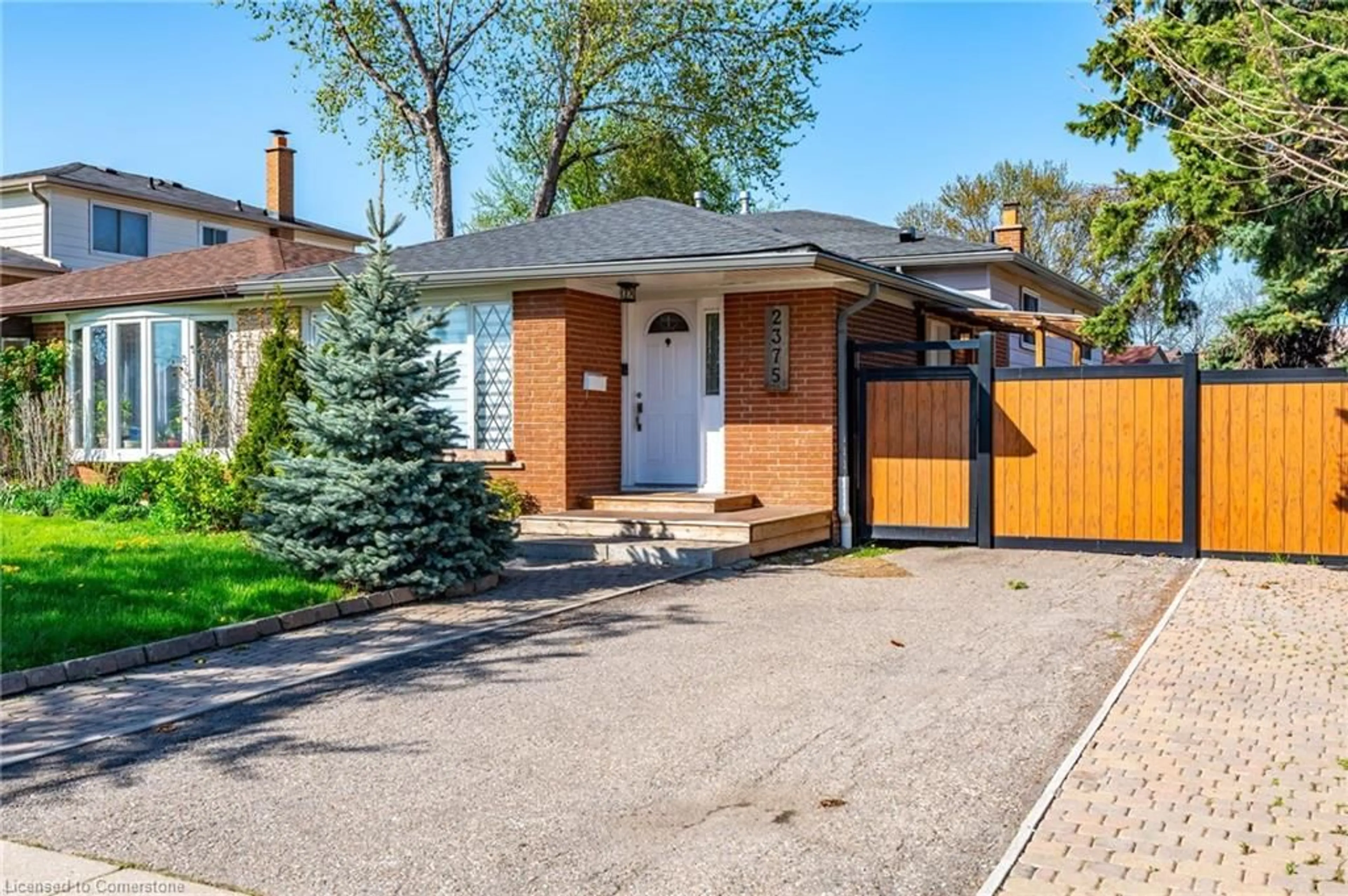 Home with brick exterior material, street for 2375 Gareth Rd, Mississauga Ontario L5B 1Z4