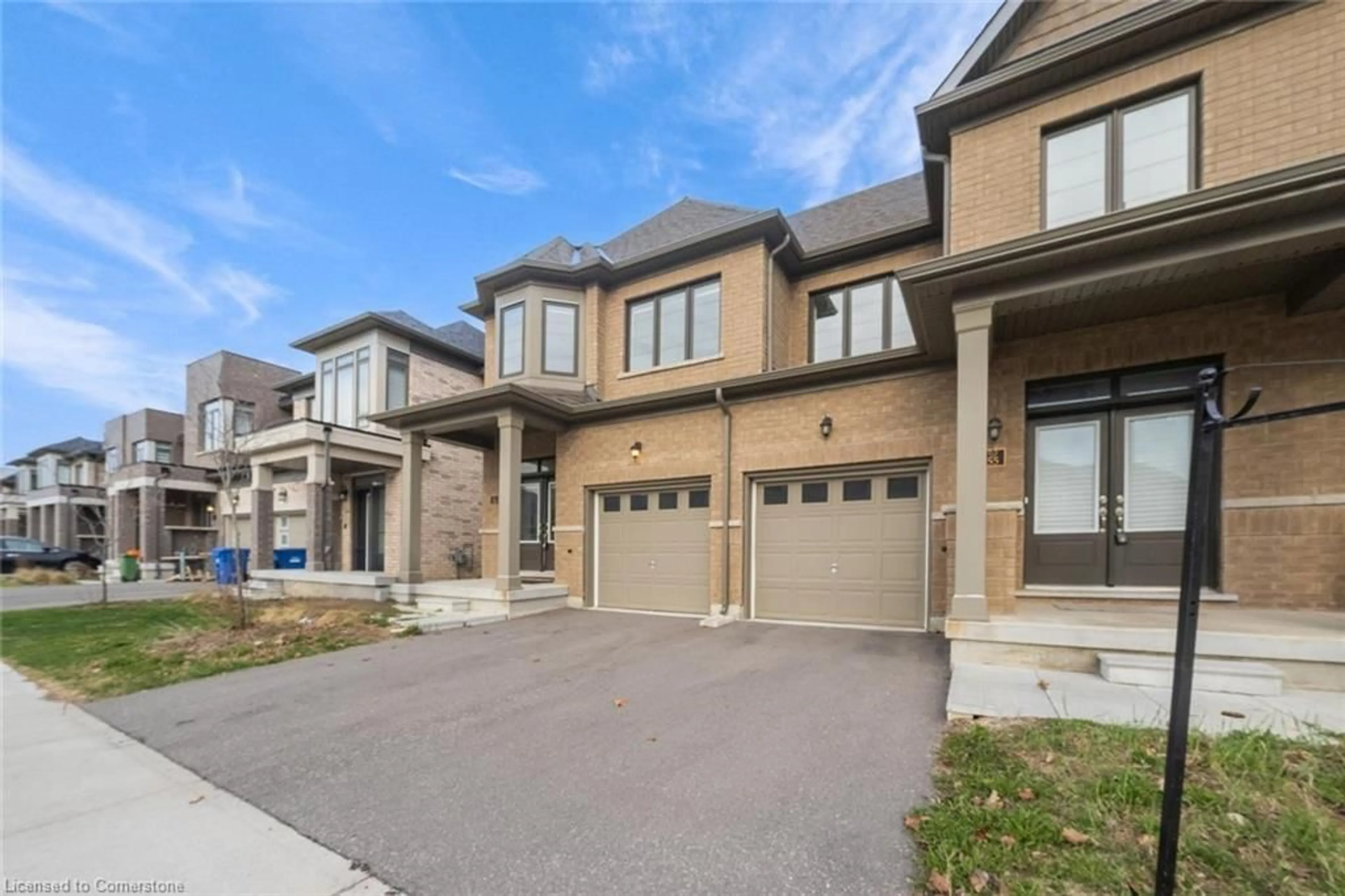 Home with brick exterior material, street for 166 Deerpath Dr Dr #54, Guelph Ontario N1K 1W6