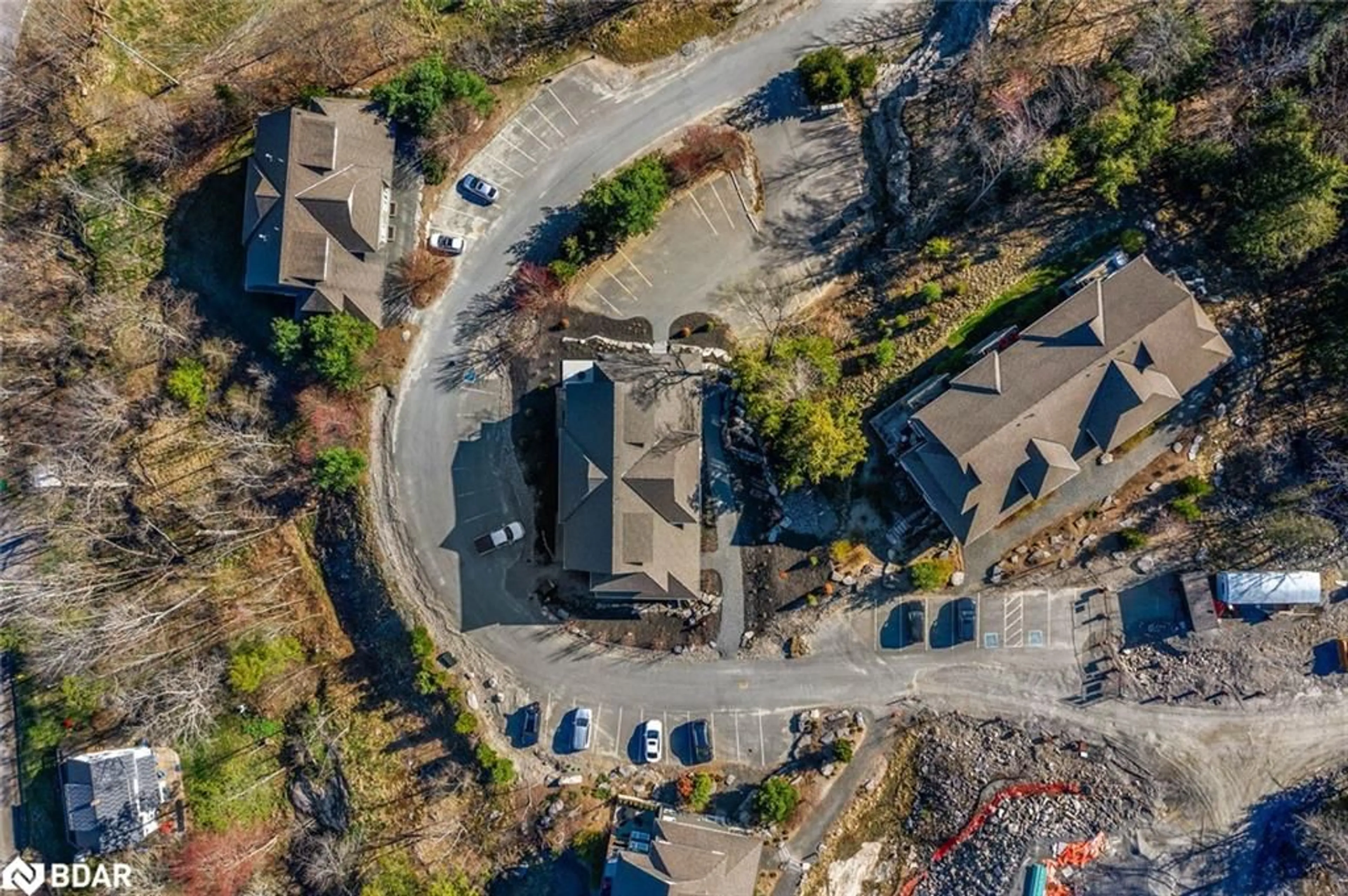 A pic from outside/outdoor area/front of a property/back of a property/a pic from drone, street for 2 Tree Tops Lane, Huntsville Ontario P1H 0B8