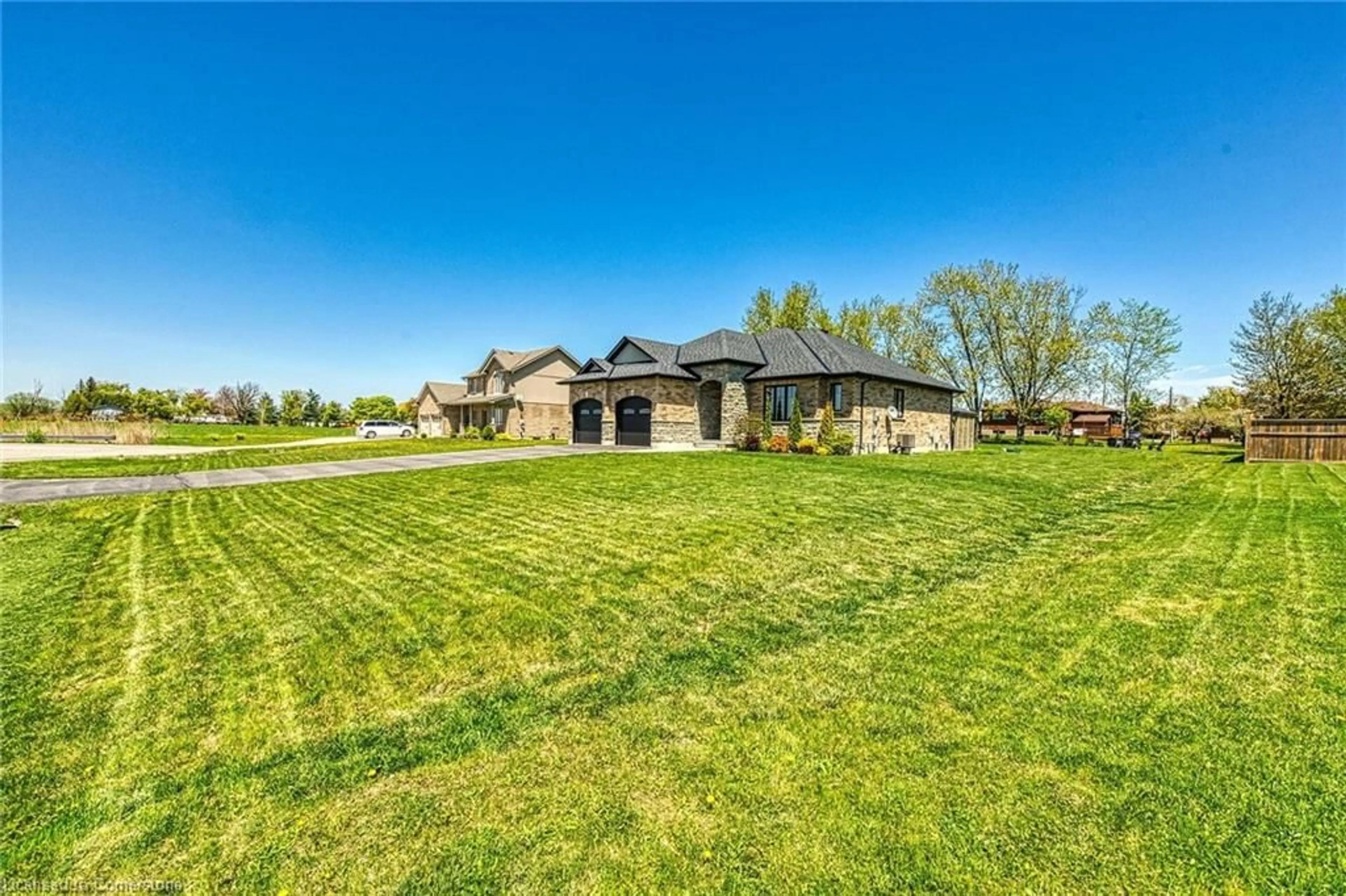 A pic from outside/outdoor area/front of a property/back of a property/a pic from drone, street for 4 Held Cres, Fisherville Ontario N0A 1G0