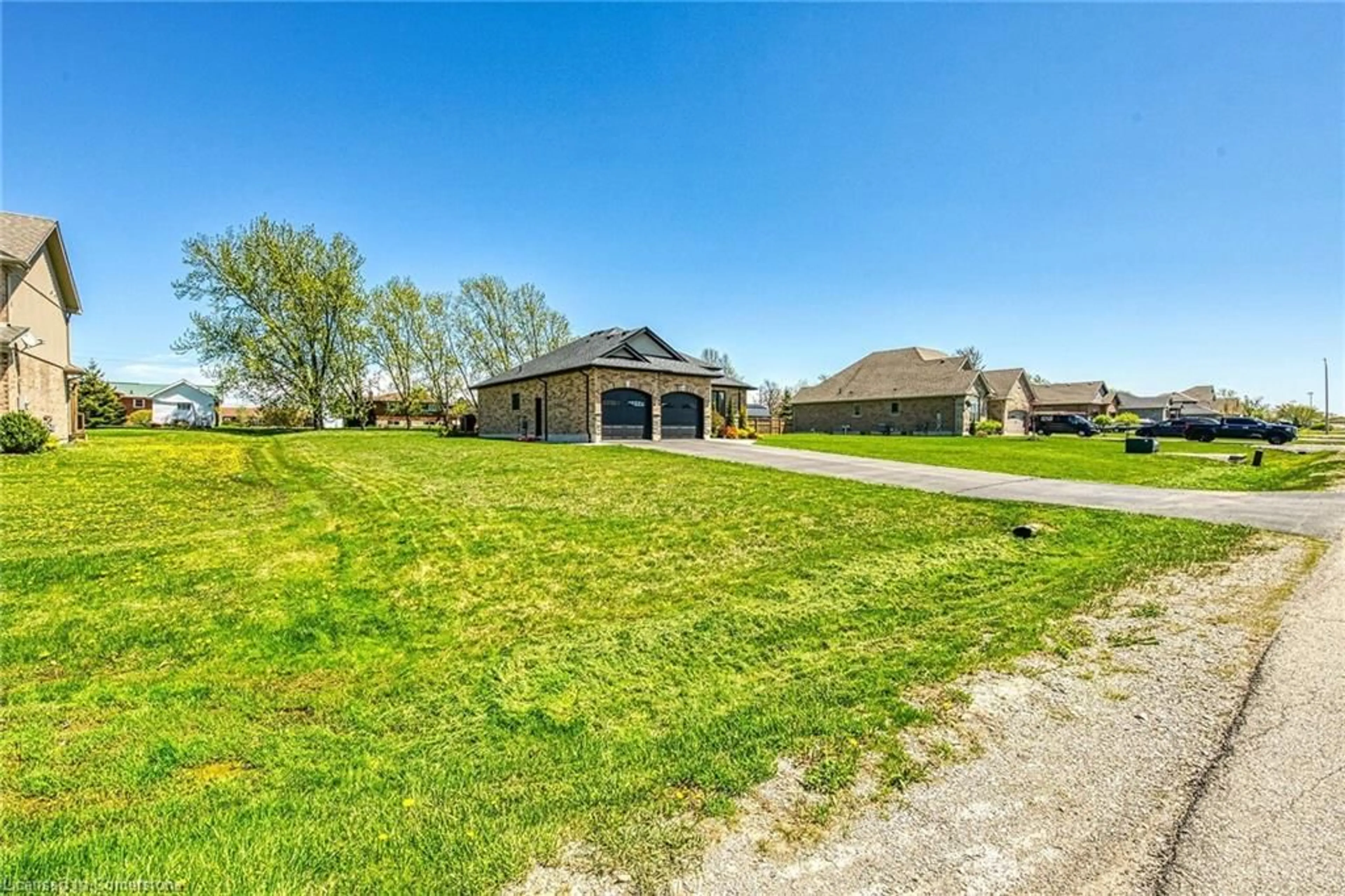 A pic from outside/outdoor area/front of a property/back of a property/a pic from drone, unknown for 4 Held Cres, Fisherville Ontario N0A 1G0
