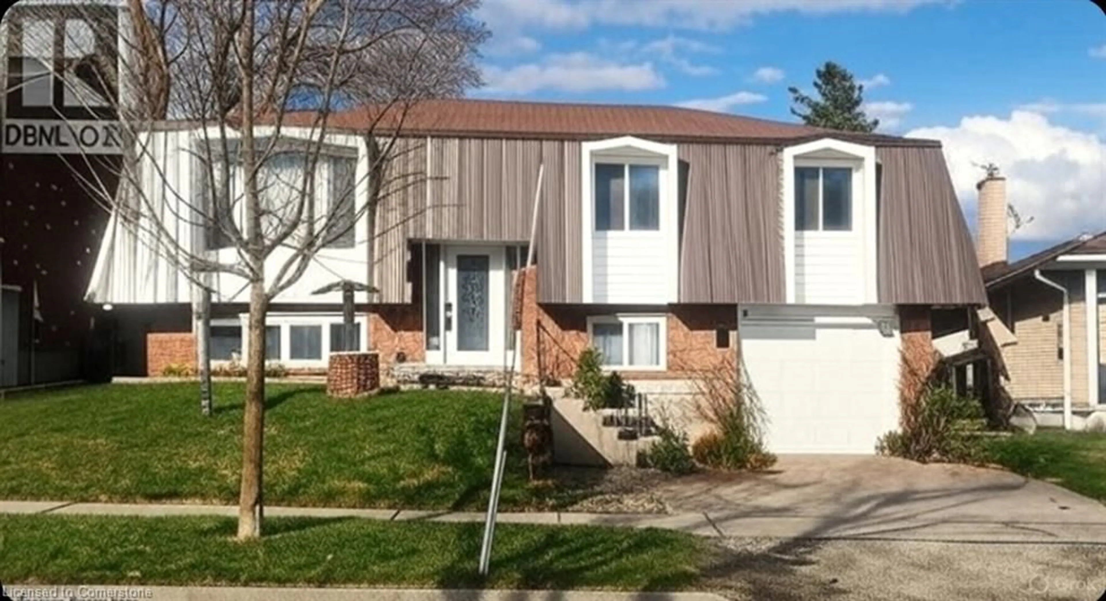 Home with vinyl exterior material, street for 320 Country Hill Dr, Kitchener Ontario N2E 2C2
