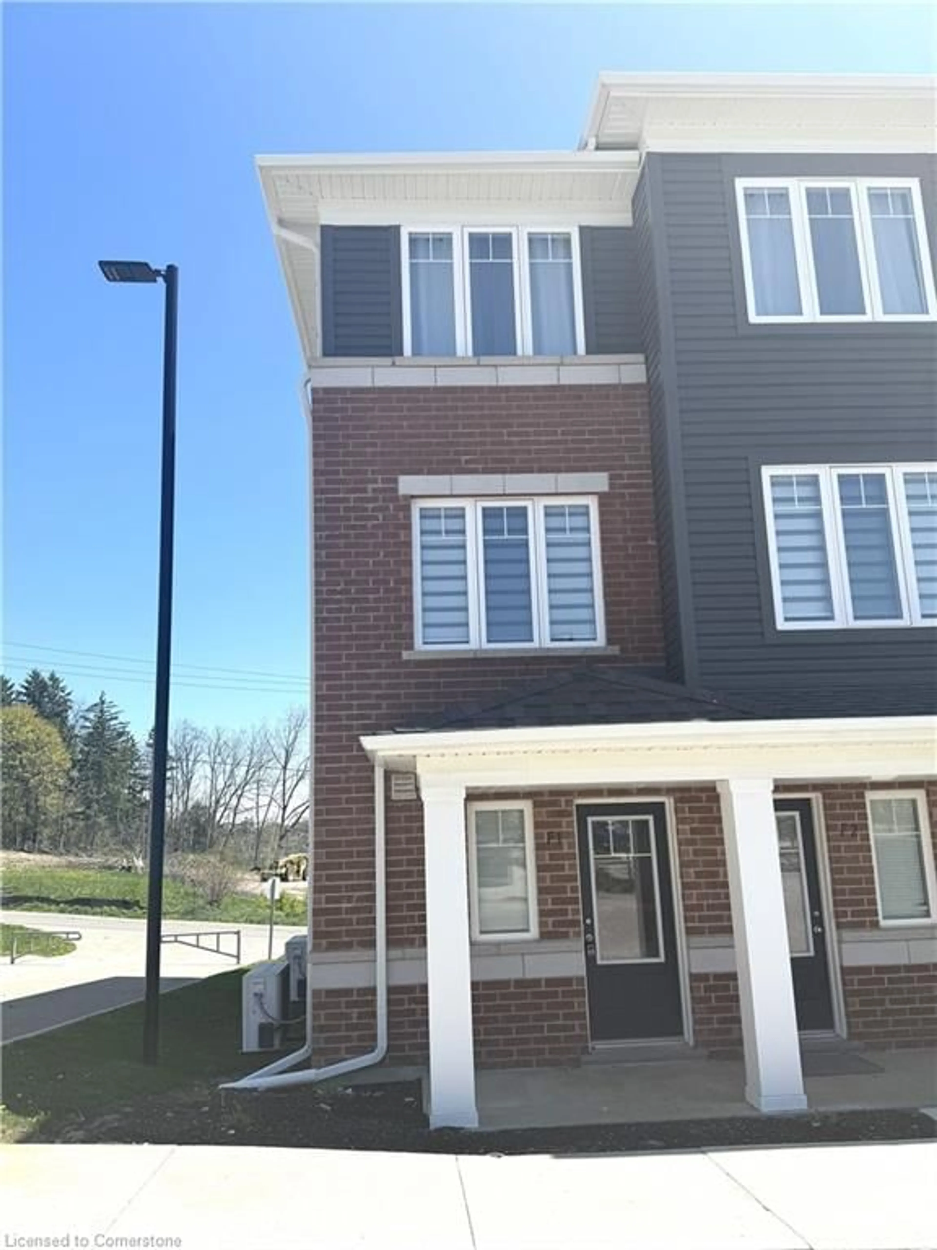 Home with brick exterior material, street for 24 Morrison Rd #F1, Kitchener Ontario N2A 0L1