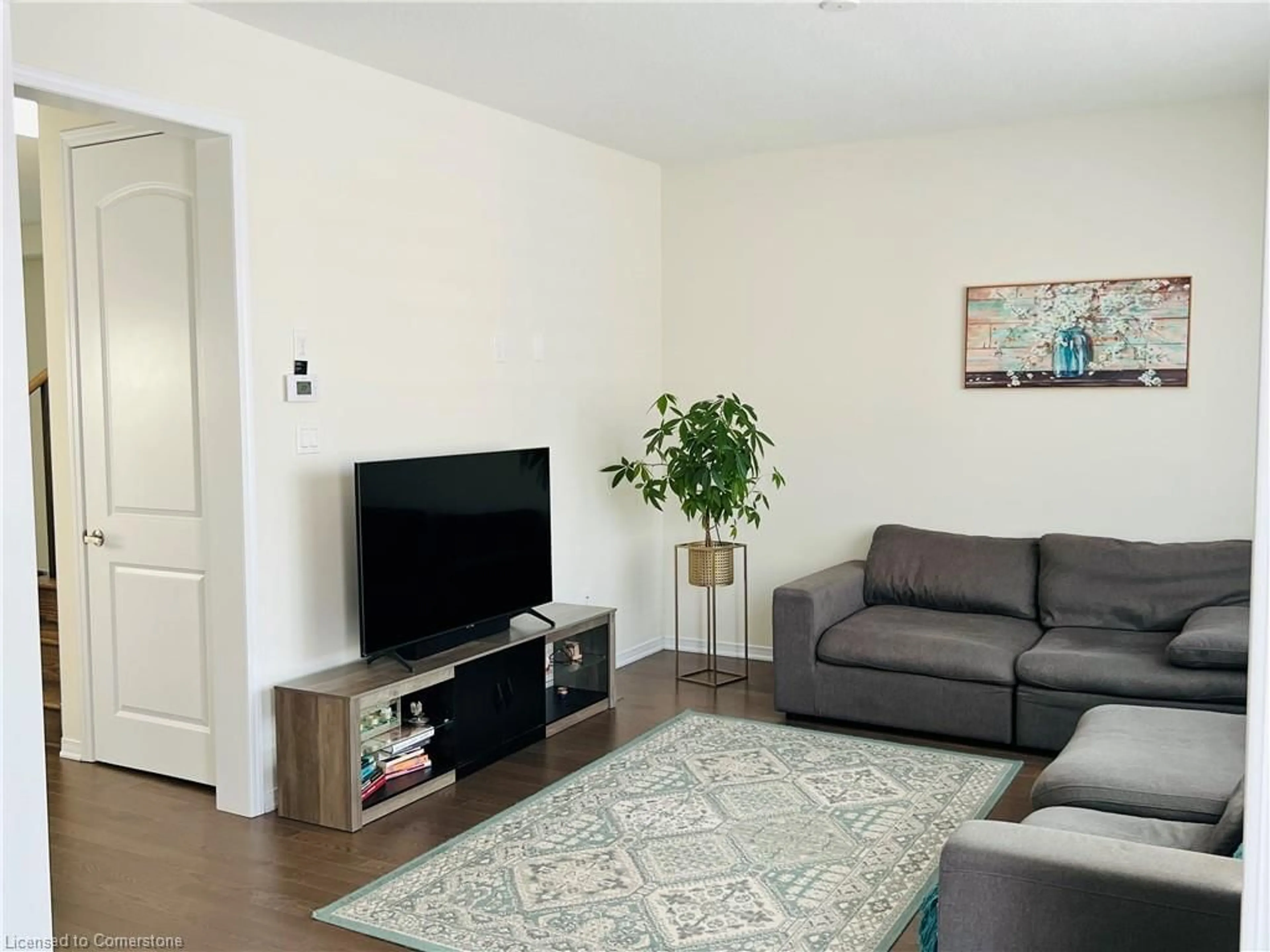 Living room with furniture, wood/laminate floor for 114 David St, Hagersville Ontario N0A 1H0