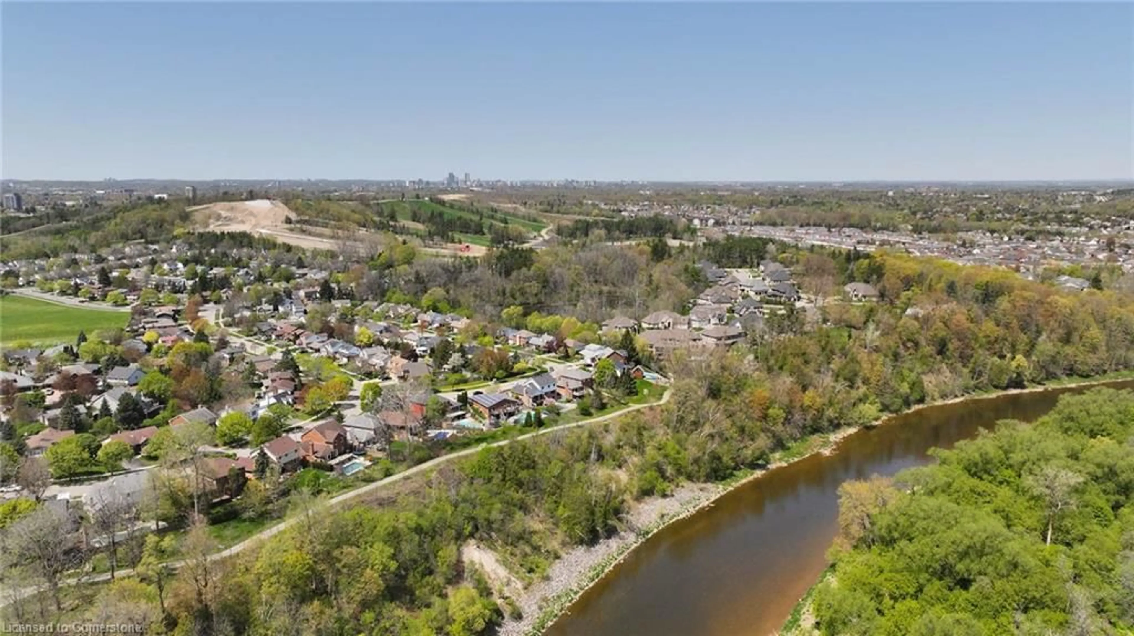 A pic from outside/outdoor area/front of a property/back of a property/a pic from drone, water/lake/river/ocean view for 69 Manitoulin Cres, Kitchener Ontario N2A 3H6
