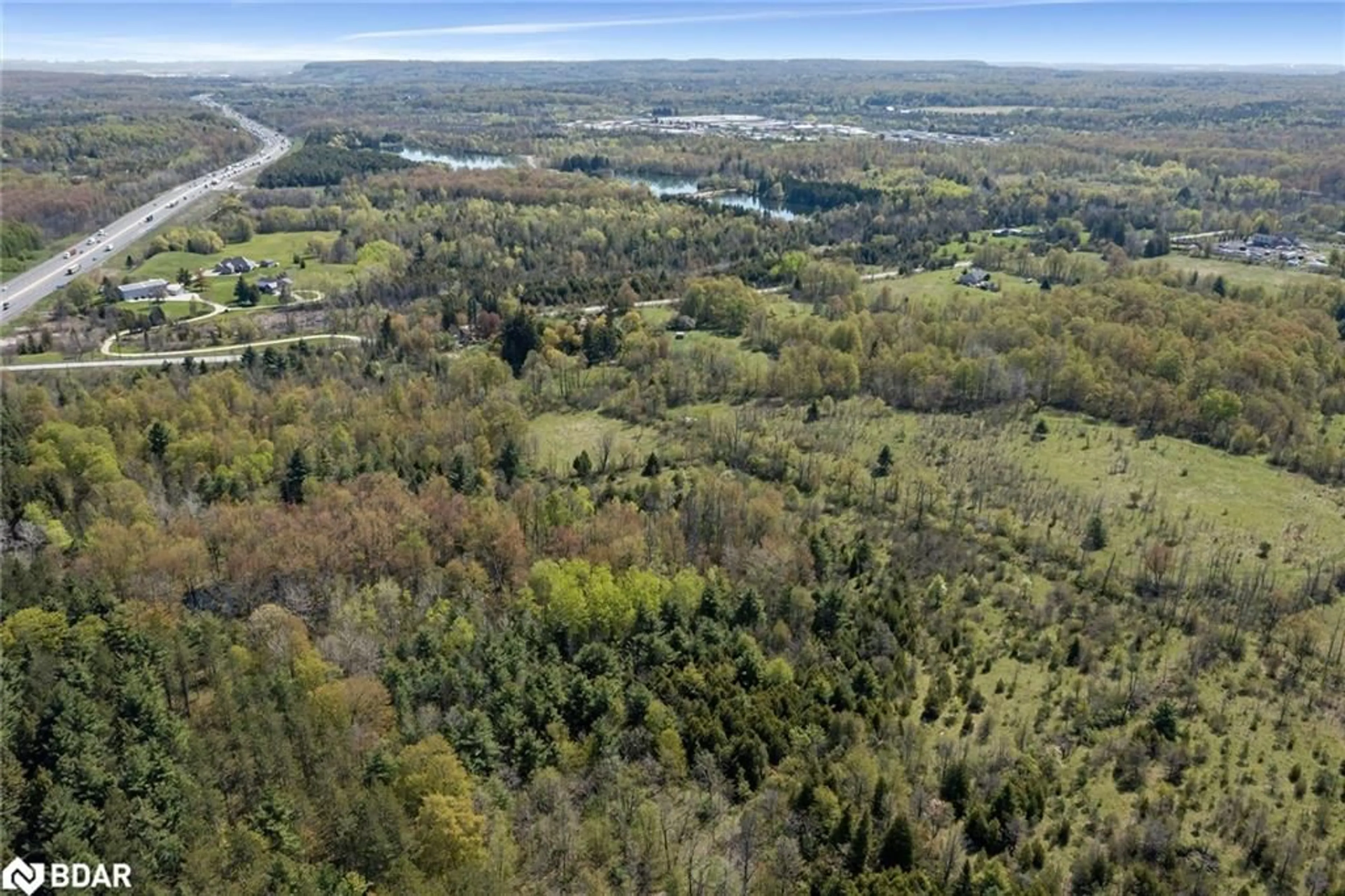 A pic from outside/outdoor area/front of a property/back of a property/a pic from drone, forest/trees view for 9414 First Line Nassagweya, Milton Ontario L9T 2X7