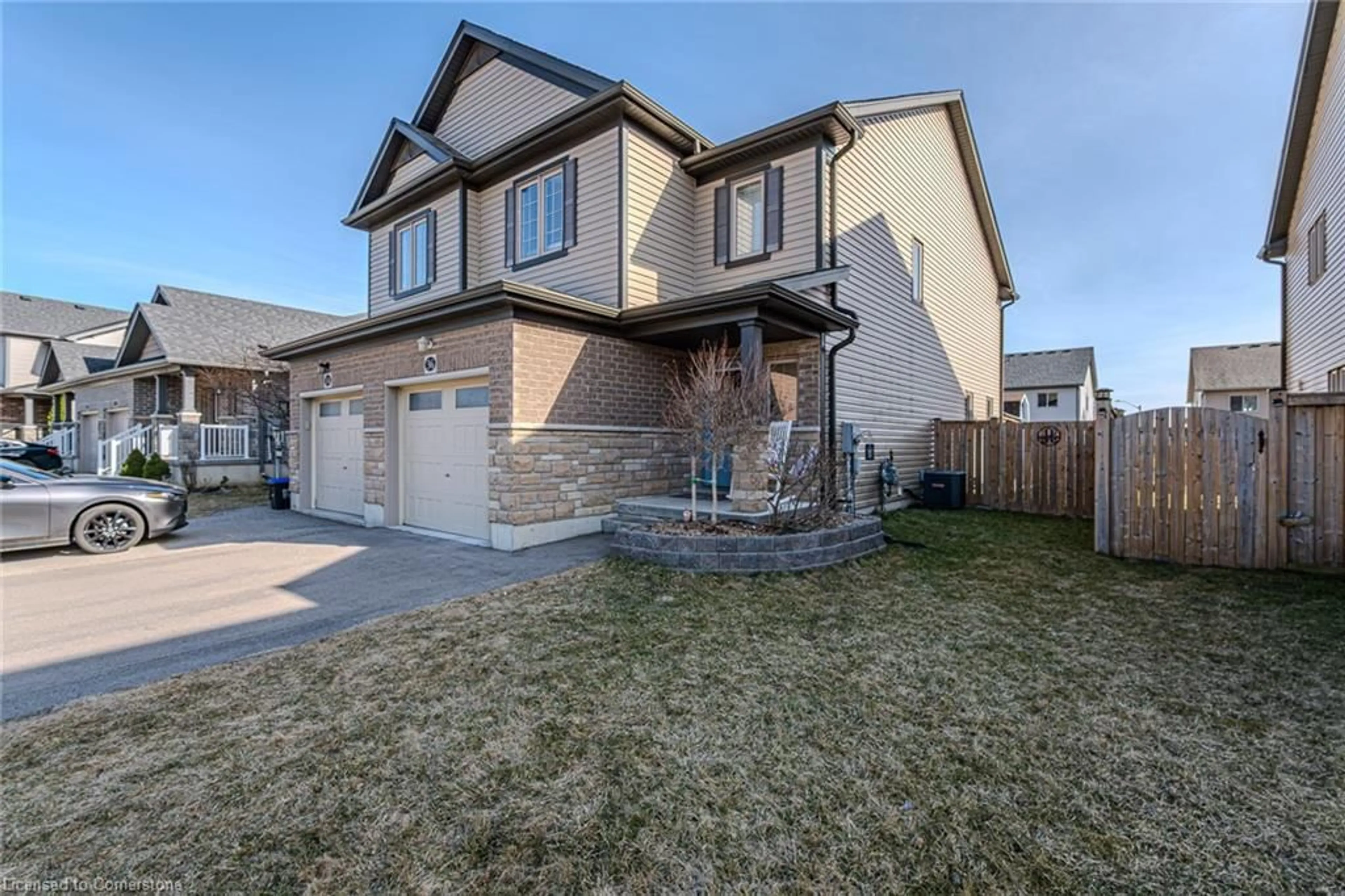 Home with brick exterior material, street for 36 Basswood Rd, Simcoe Ontario N3Y 0E1