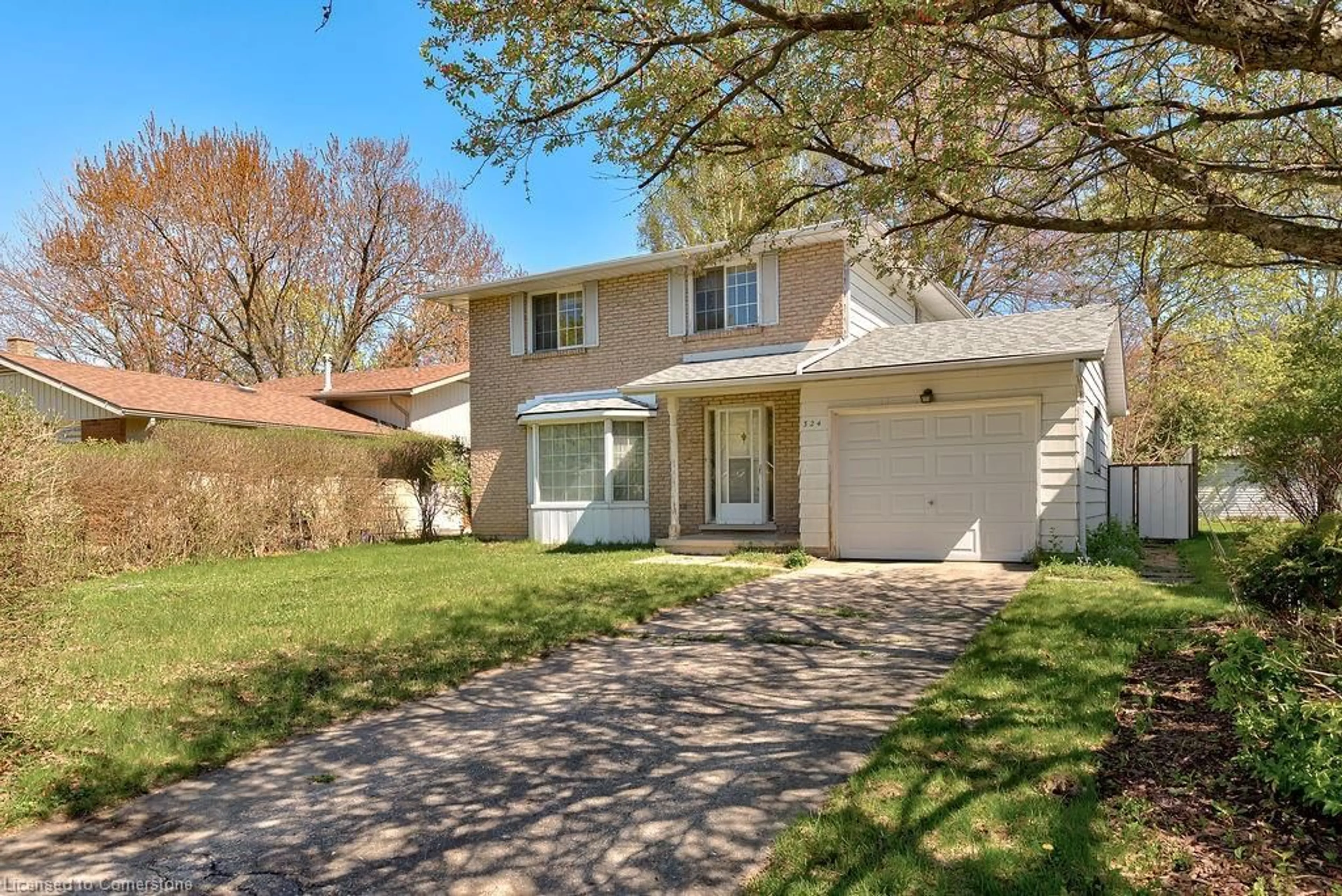 Home with vinyl exterior material, street for 324 Sandowne Dr, Waterloo Ontario N2K 1V8