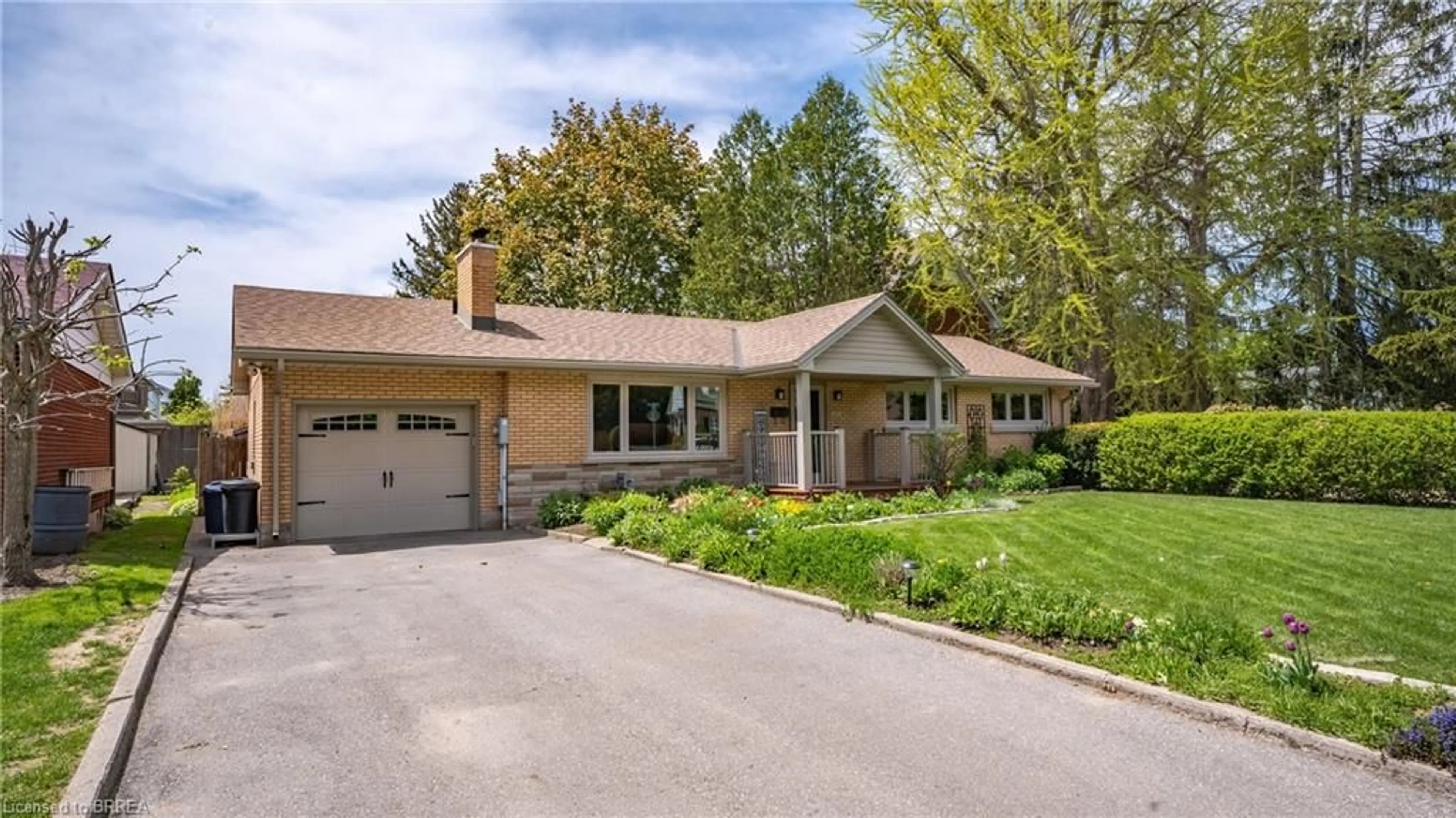 Home with brick exterior material, street for 283 Erie Ave, Brantford Ontario N3S 2H5