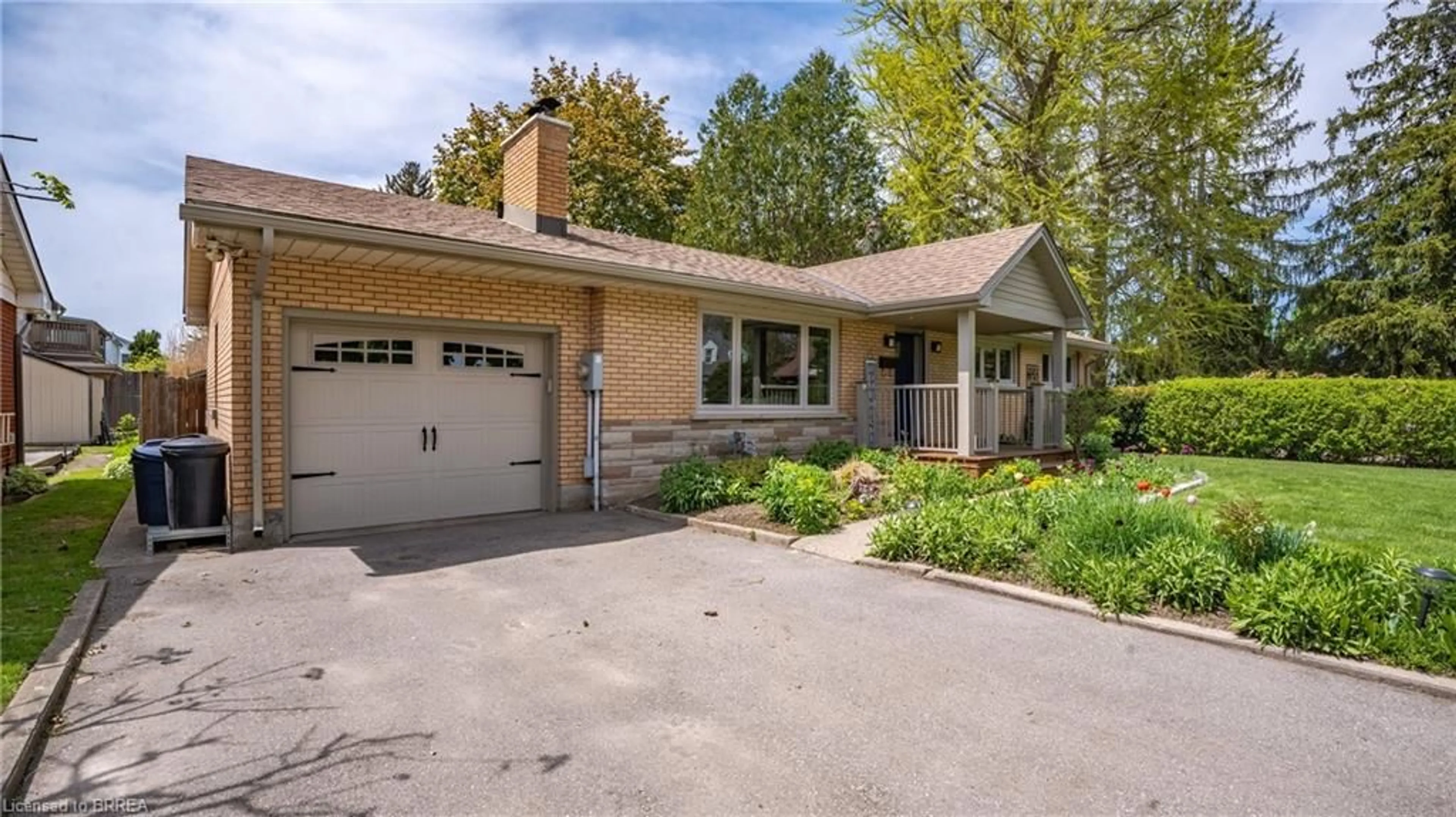 Home with brick exterior material, street for 283 Erie Ave, Brantford Ontario N3S 2H5