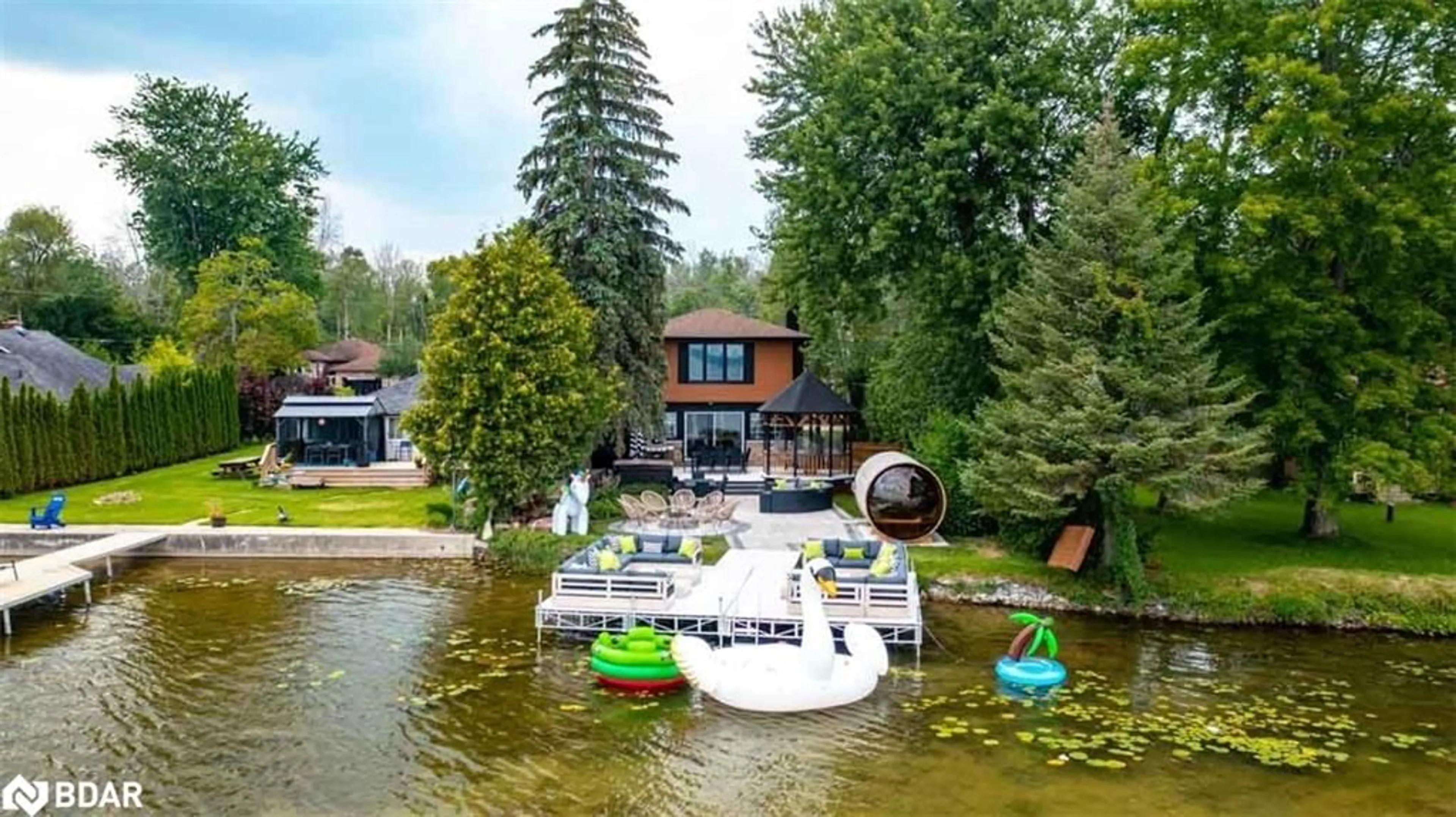 A pic from outside/outdoor area/front of a property/back of a property/a pic from drone, water/lake/river/ocean view for 943 Barry Ave, Innisfil Ontario L0L 1W0
