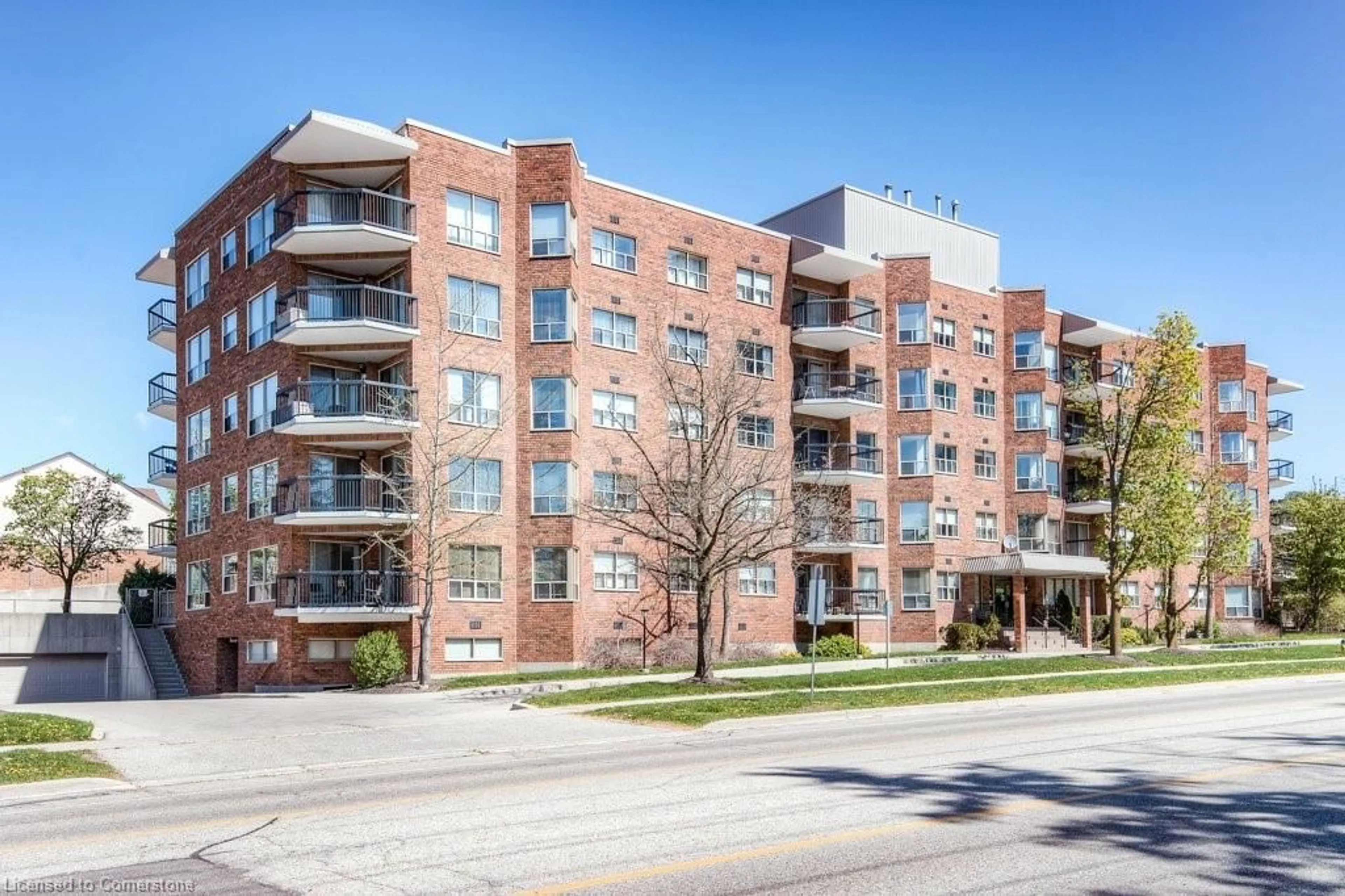 Home with brick exterior material, building for 300 Keats Way #205, Waterloo Ontario N2L 6E6