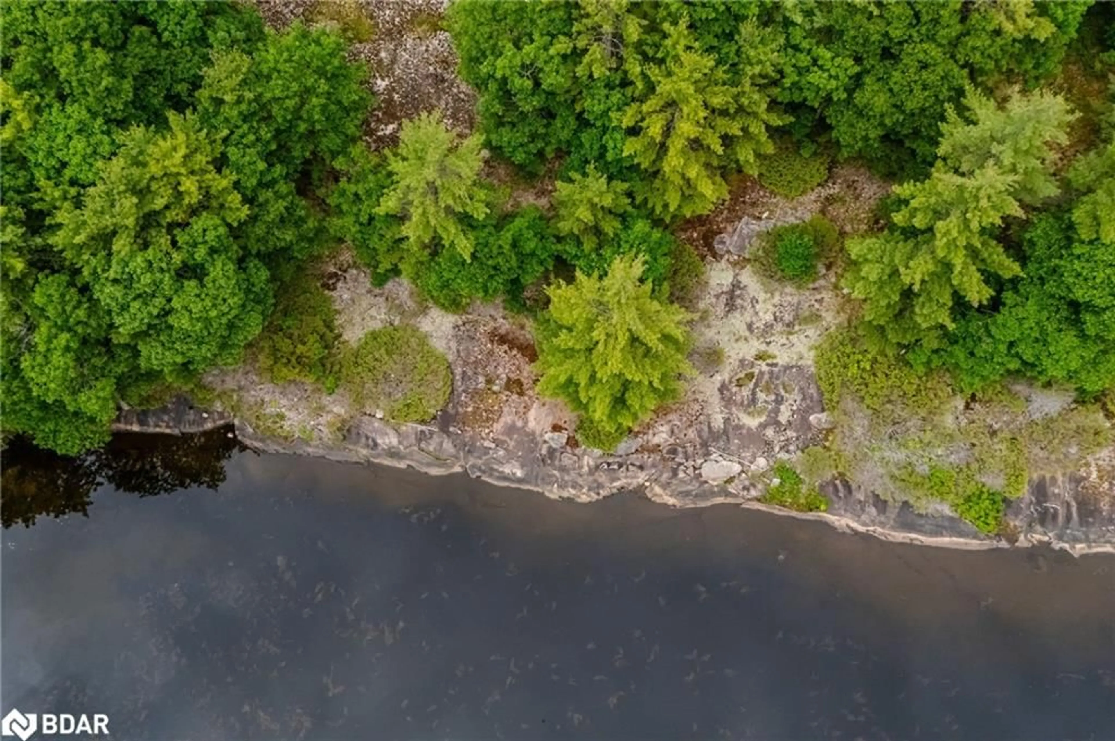A pic from outside/outdoor area/front of a property/back of a property/a pic from drone, water/lake/river/ocean view for LOT 1 Delta Rd, Washago Ontario L0K 2B0
