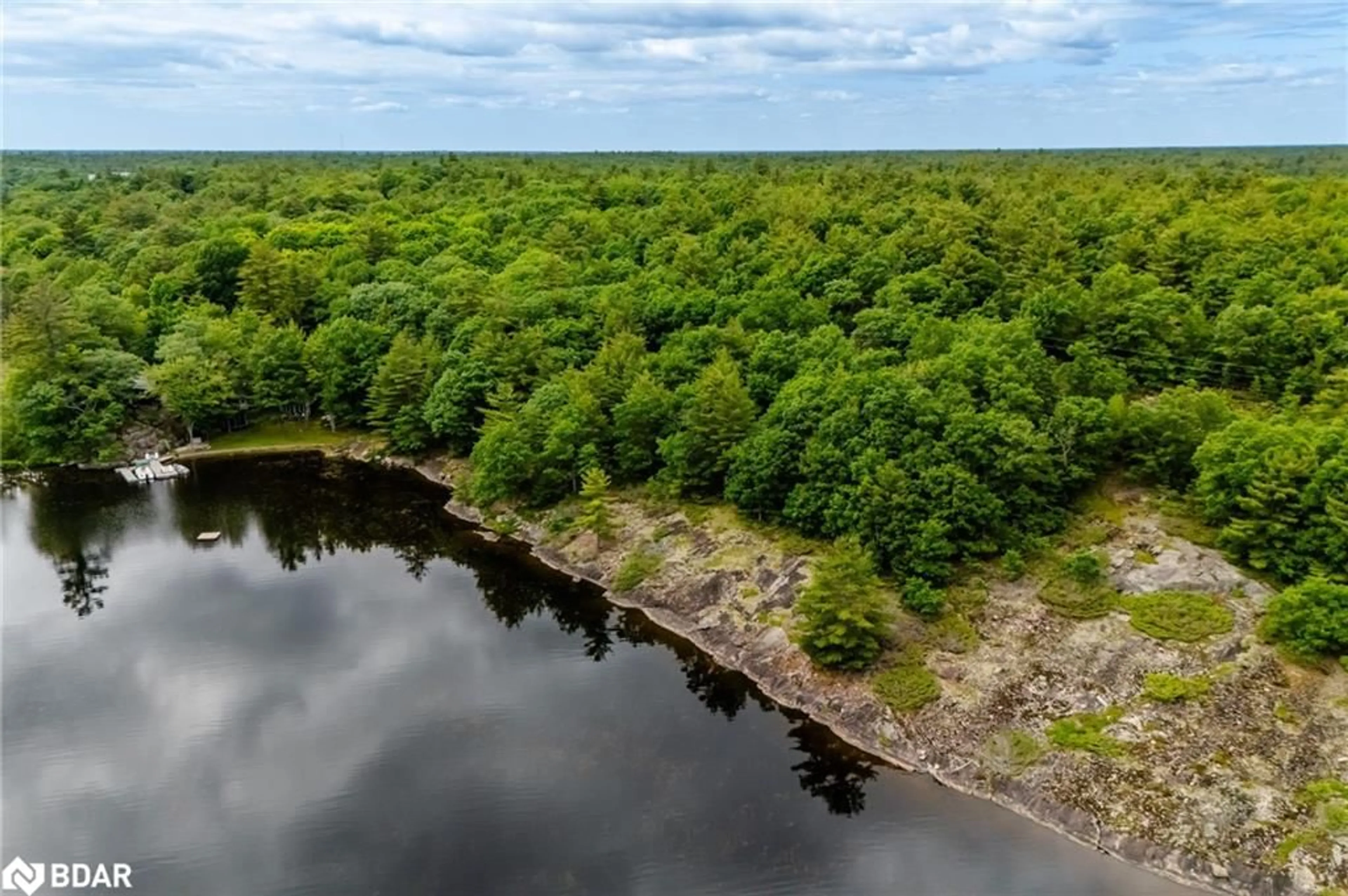 A pic from outside/outdoor area/front of a property/back of a property/a pic from drone, water/lake/river/ocean view for LOT 1 Delta Rd, Washago Ontario L0K 2B0