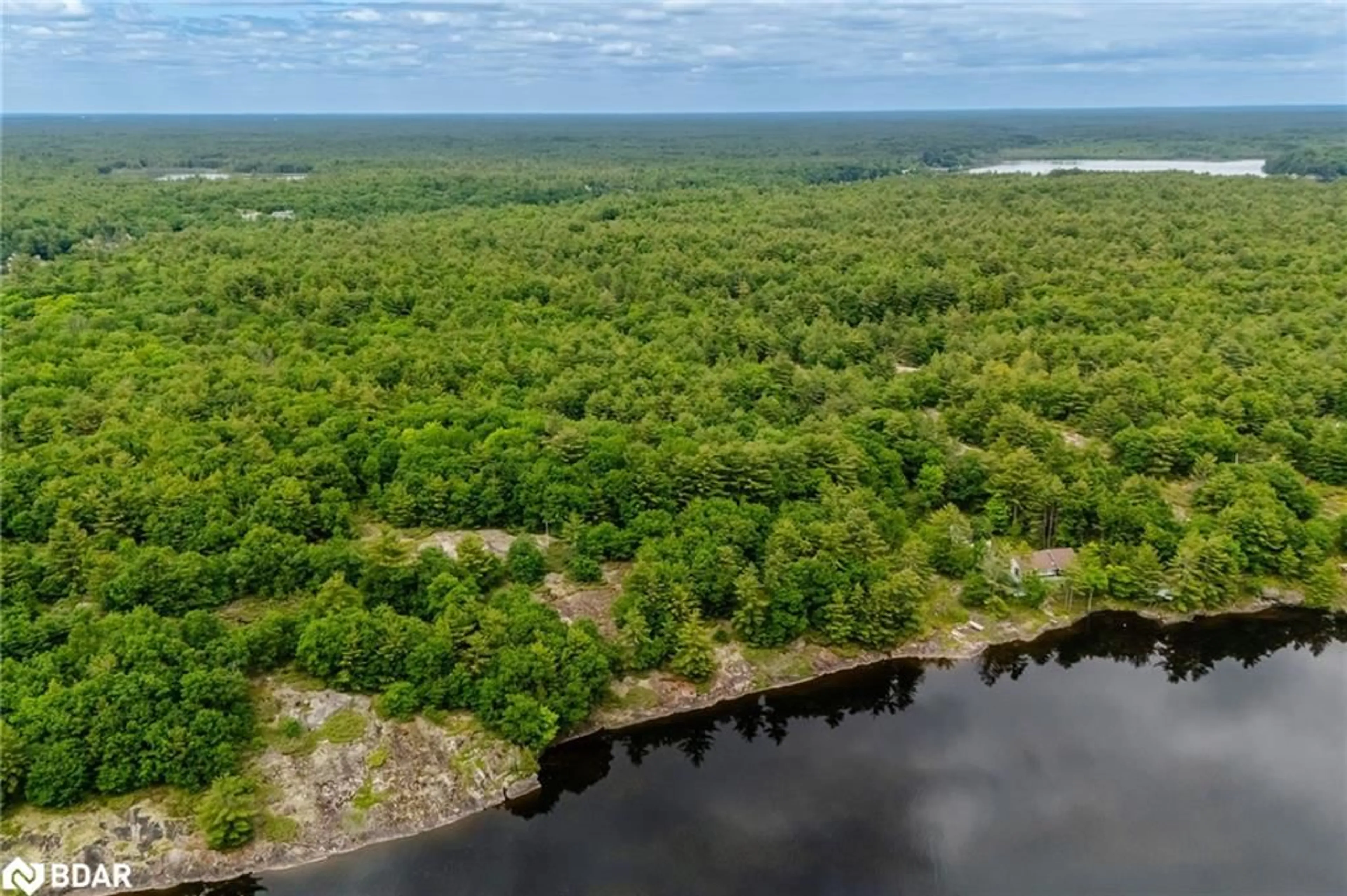 A pic from outside/outdoor area/front of a property/back of a property/a pic from drone, water/lake/river/ocean view for LOT 2 Delta Rd, Washago Ontario L0K 2B0