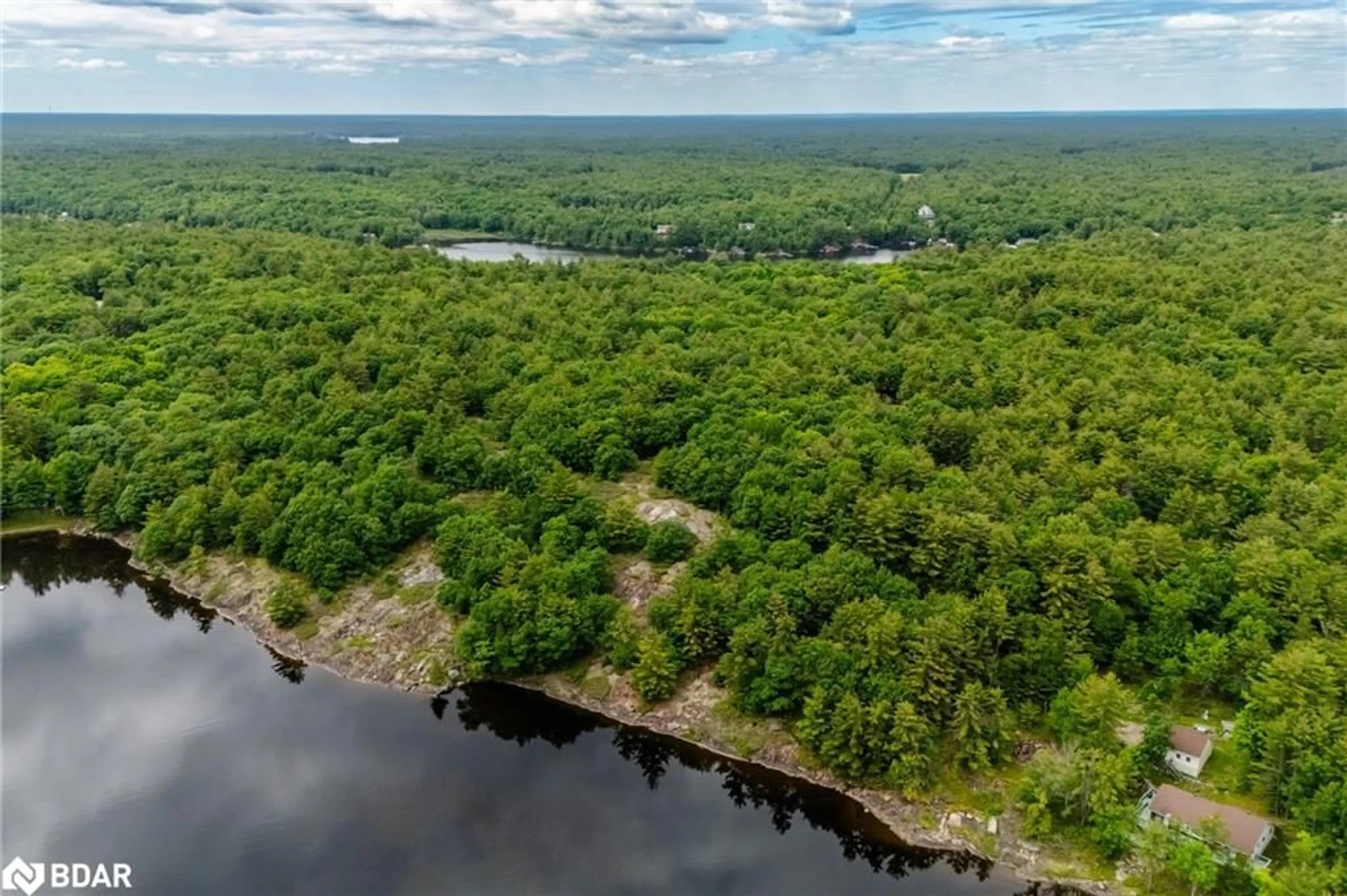A pic from outside/outdoor area/front of a property/back of a property/a pic from drone, water/lake/river/ocean view for LOT 2 Delta Rd, Washago Ontario L0K 2B0