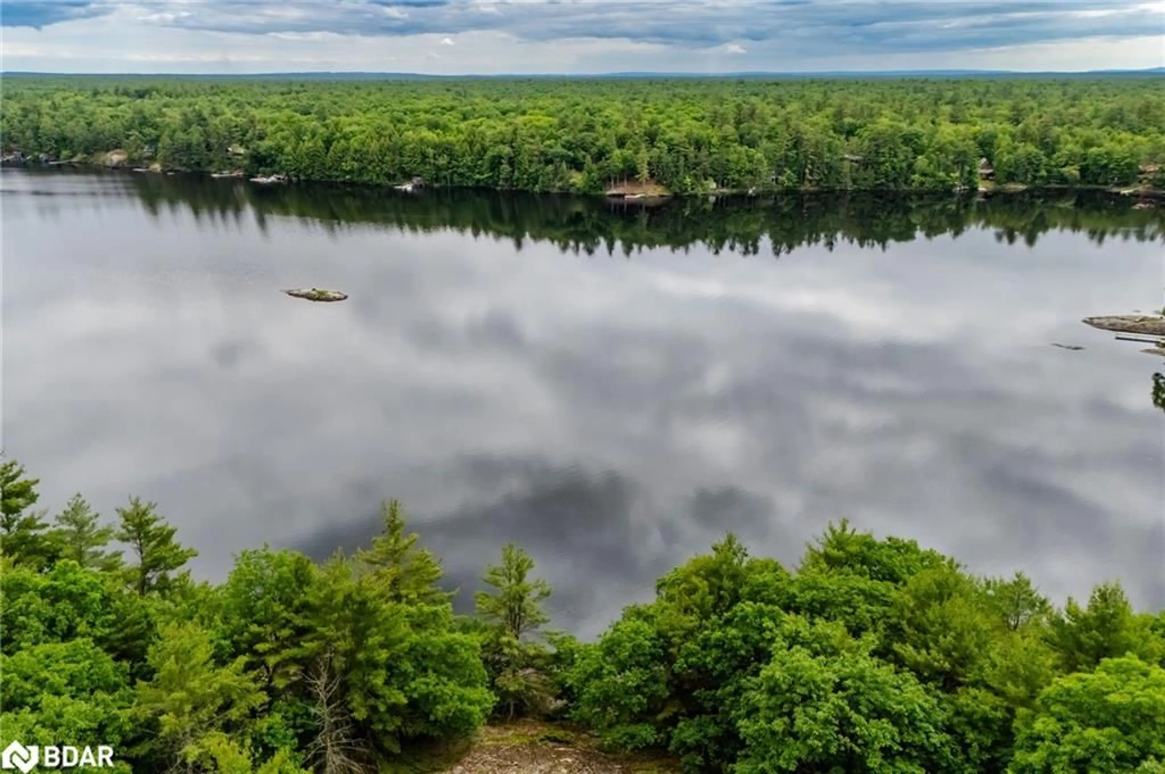 A pic from outside/outdoor area/front of a property/back of a property/a pic from drone, water/lake/river/ocean view for LOT 2 Delta Rd, Washago Ontario L0K 2B0