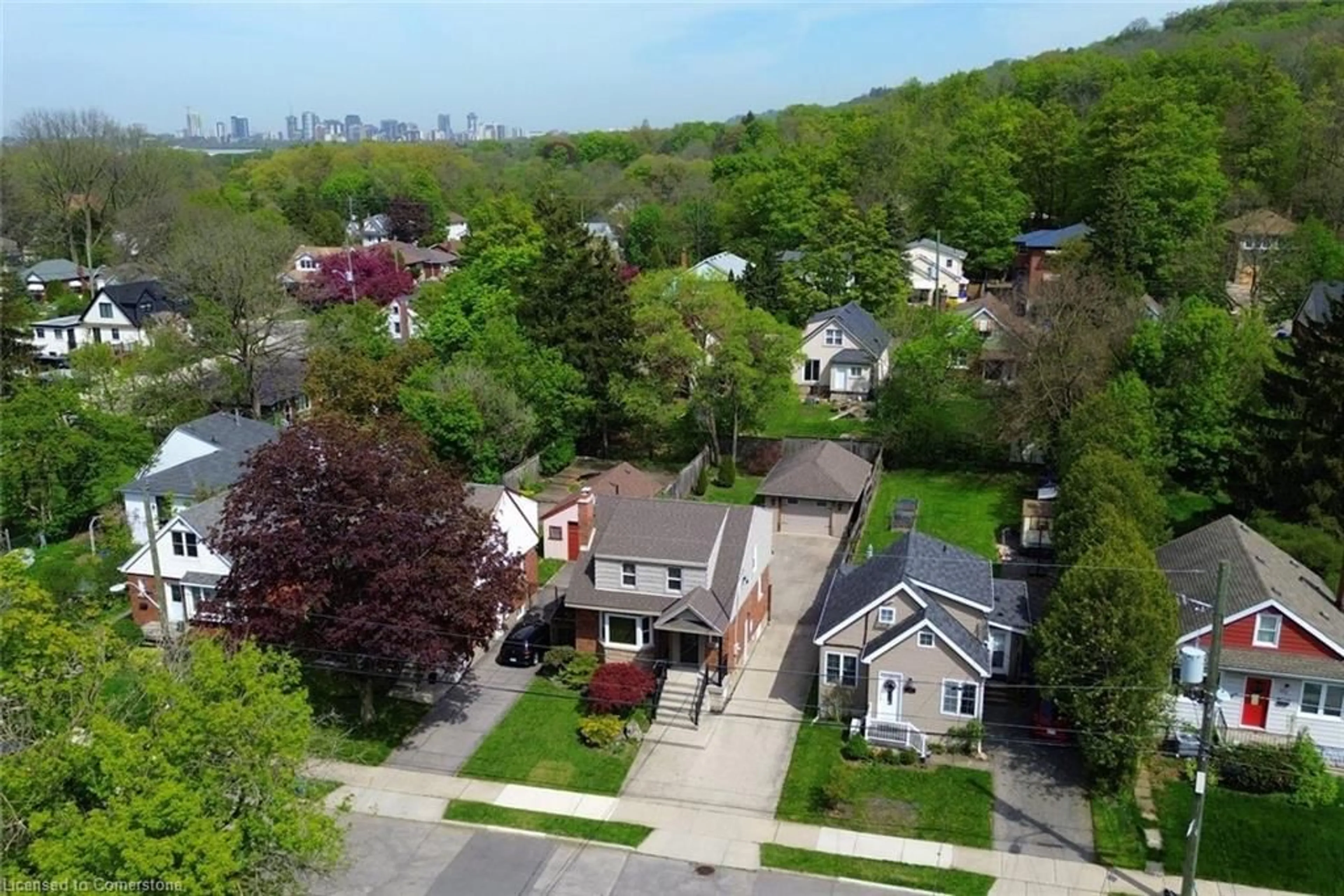 A pic from outside/outdoor area/front of a property/back of a property/a pic from drone, street for 293 Emerson St, Hamilton Ontario L8S 2Y8