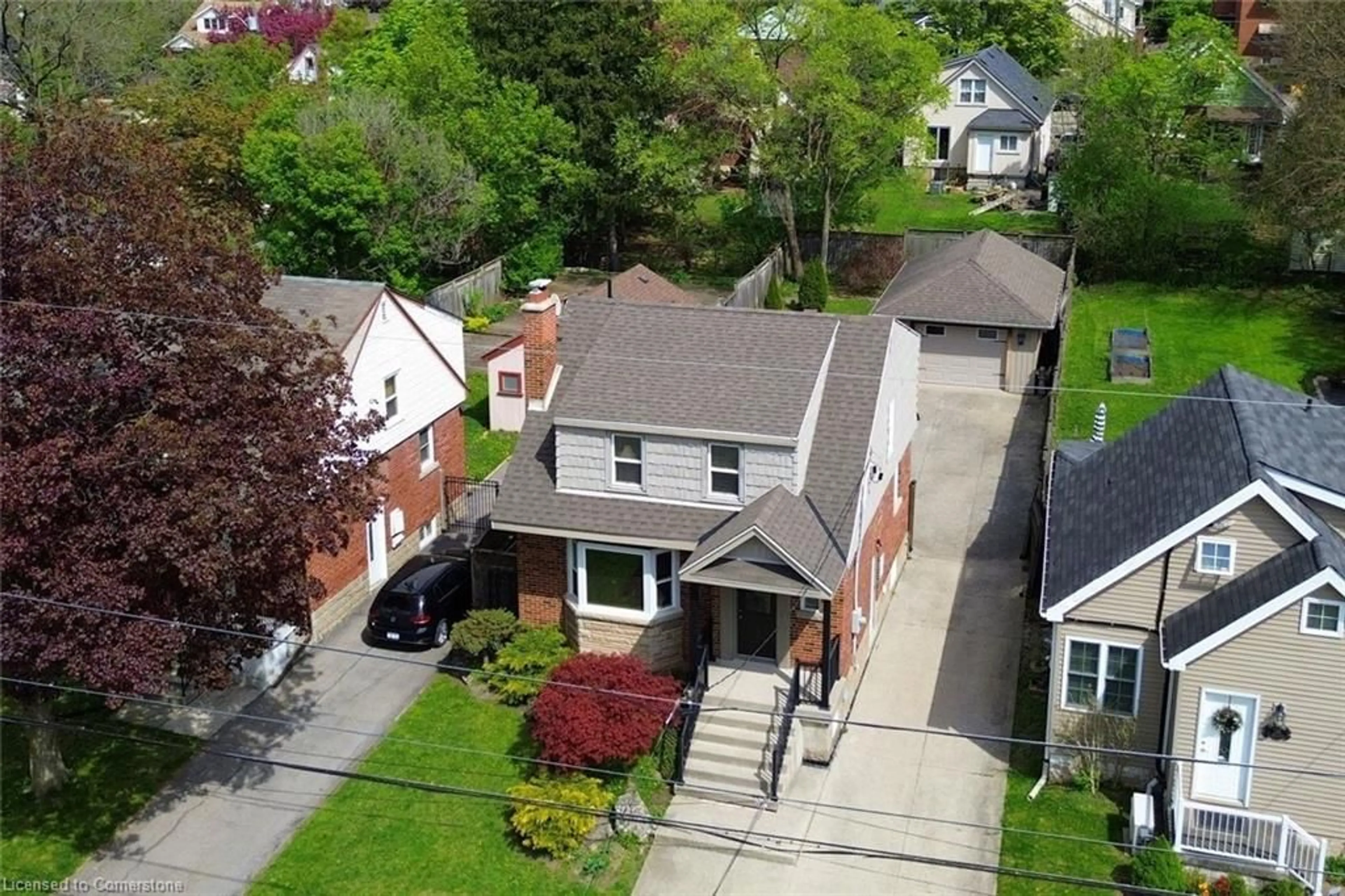 A pic from outside/outdoor area/front of a property/back of a property/a pic from drone, street for 293 Emerson St, Hamilton Ontario L8S 2Y8