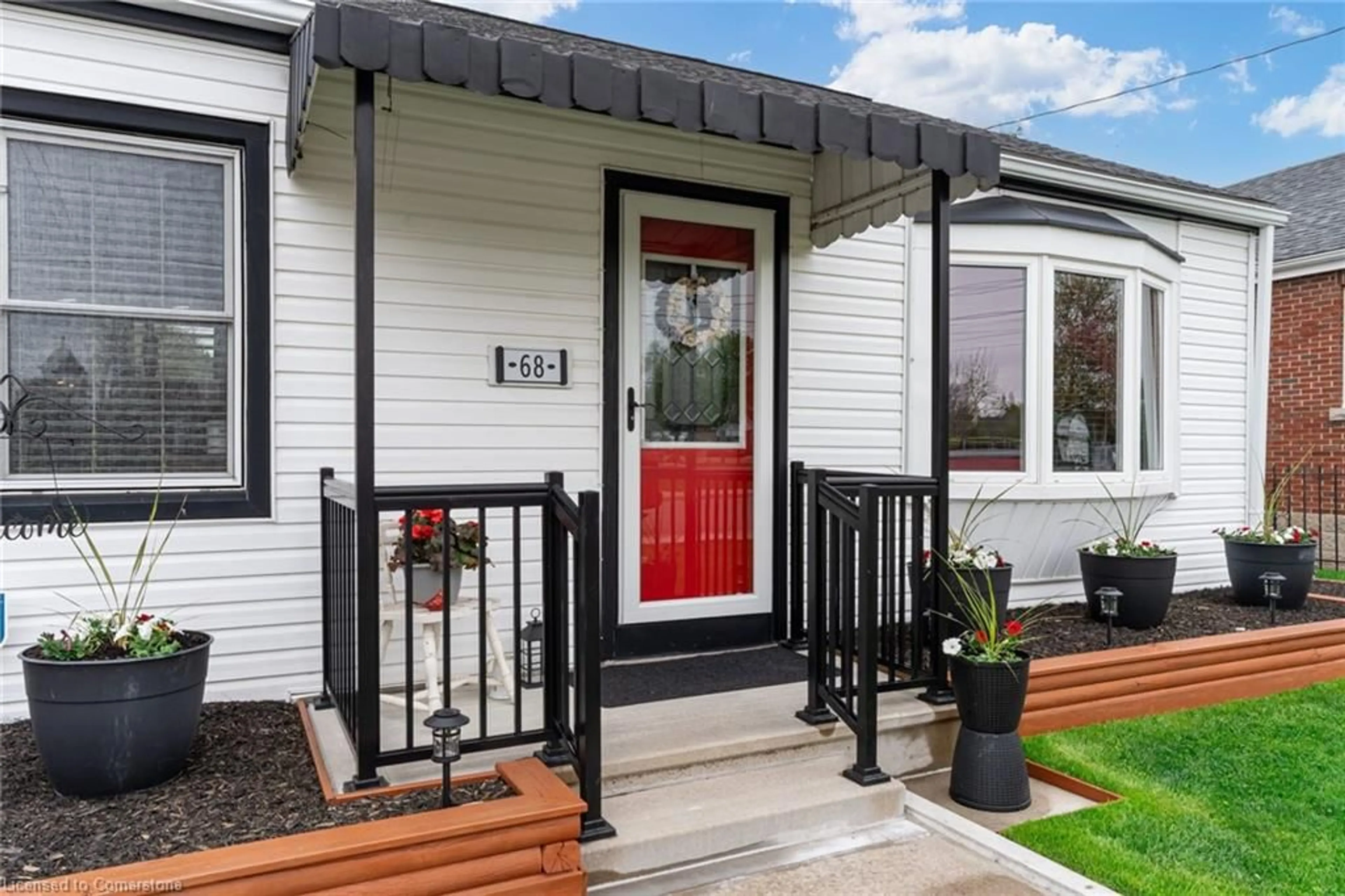 Home with vinyl exterior material, street for 68 East 36th St, Hamilton Ontario L8V 3Z1