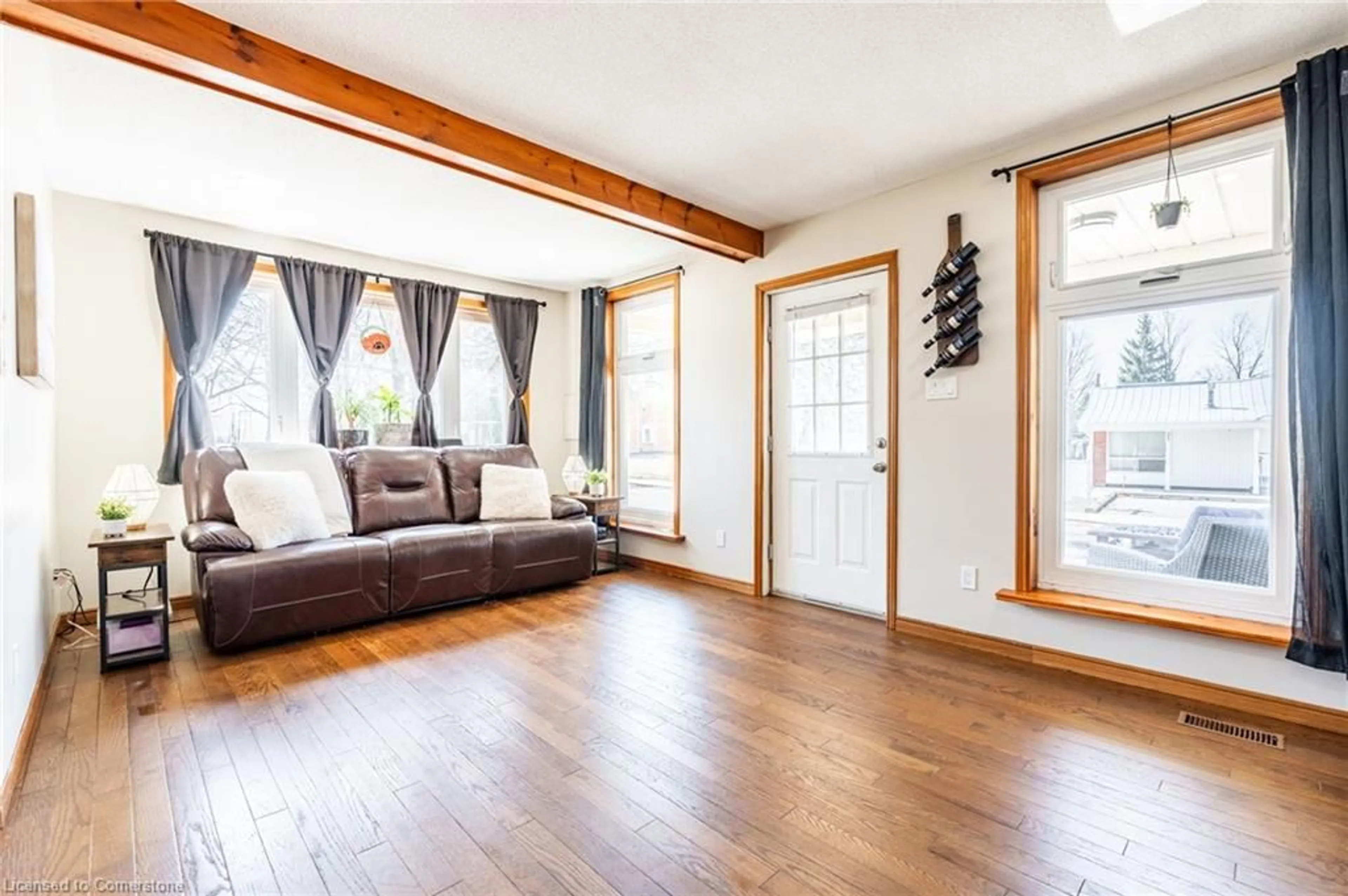 Living room with furniture, wood/laminate floor for 88 Freelton Rd, Hamilton Ontario L0R 1K0