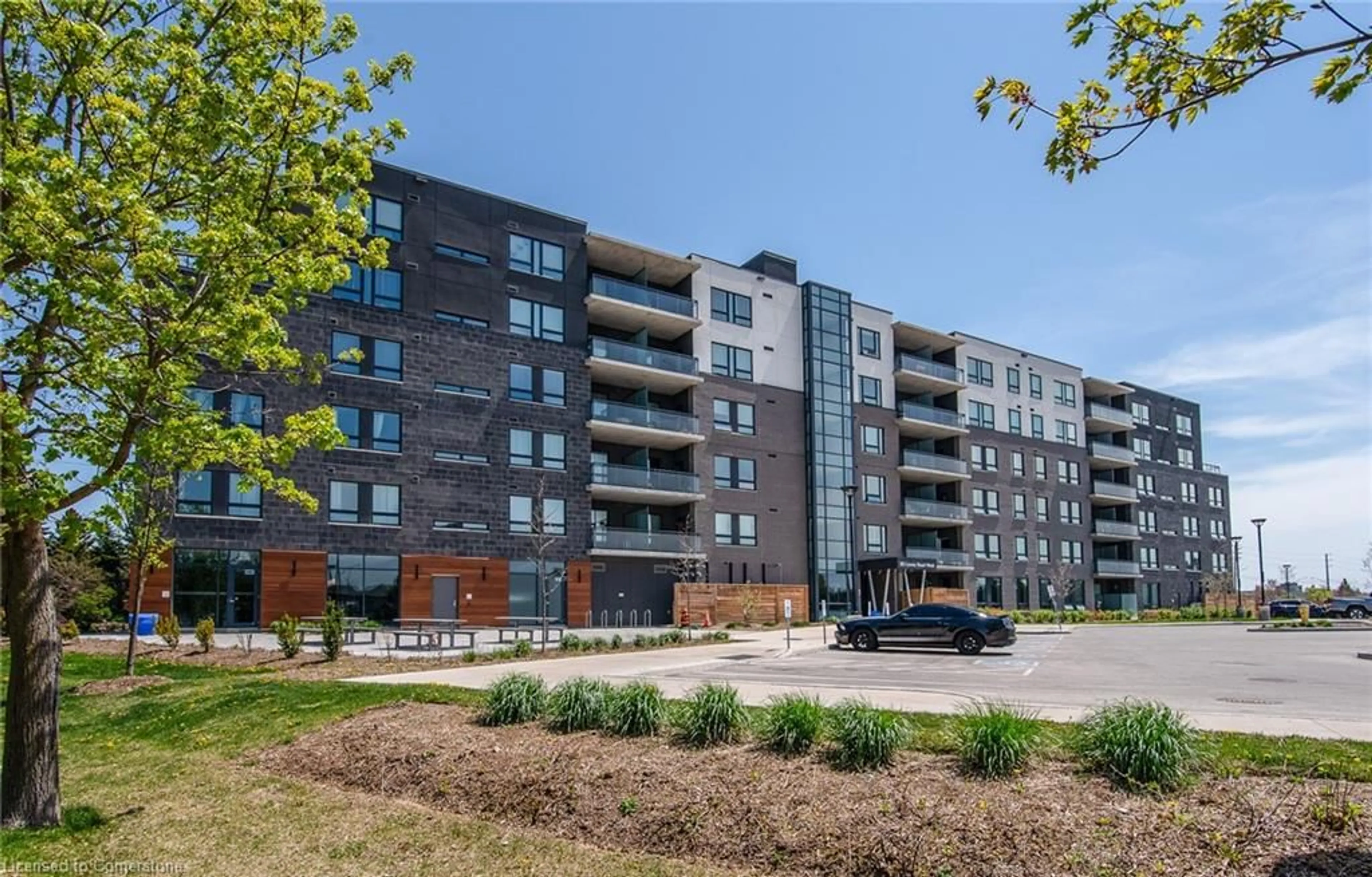 A pic from outside/outdoor area/front of a property/back of a property/a pic from drone, building for 26 Lowes Rd #210, Guelph Ontario N1L 1E1