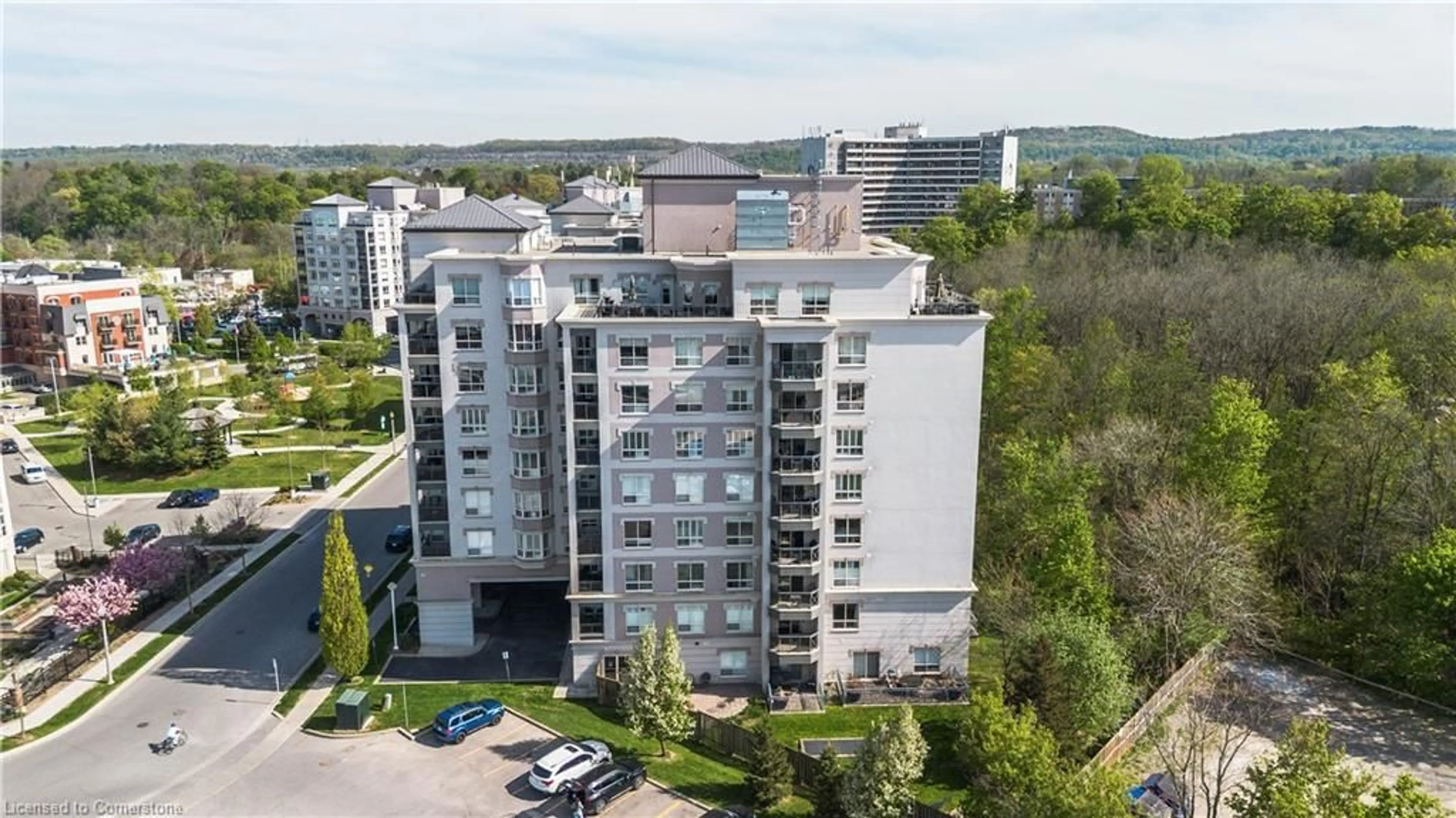 A pic from outside/outdoor area/front of a property/back of a property/a pic from drone, city buildings view from balcony for 4000 Creekside Dr #207, Dundas Ontario L9H 7S9