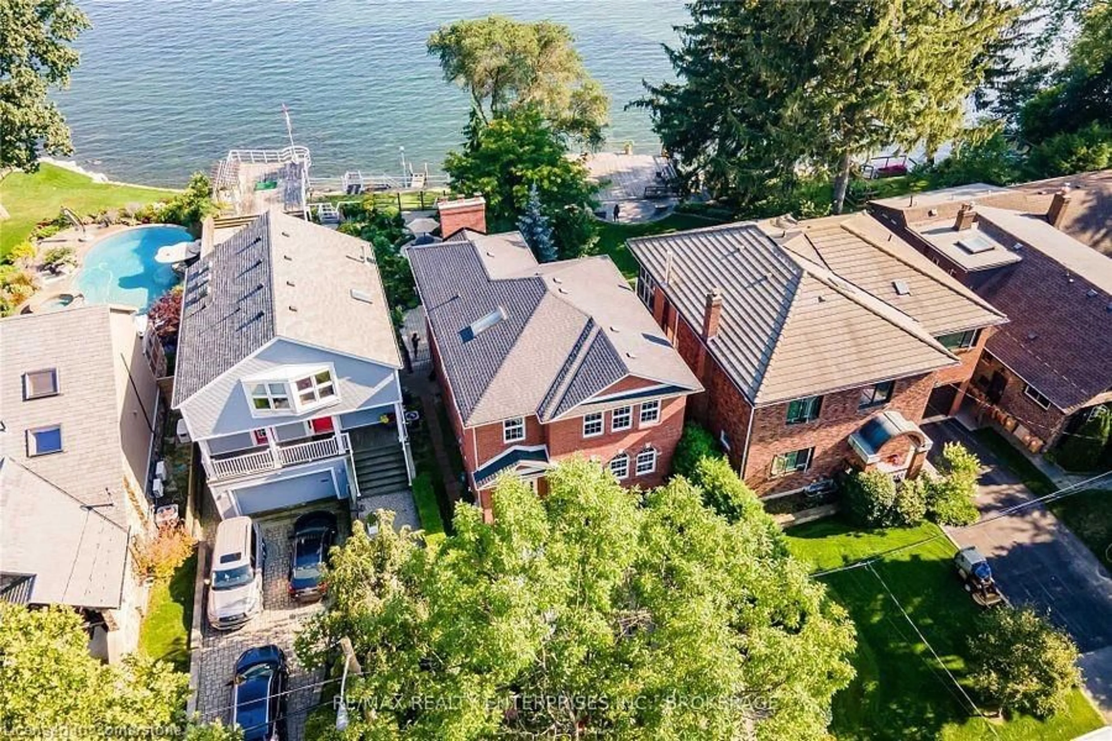 A pic from outside/outdoor area/front of a property/back of a property/a pic from drone, water/lake/river/ocean view for 327A Lake Promenade, Toronto Ontario M8W 1A6