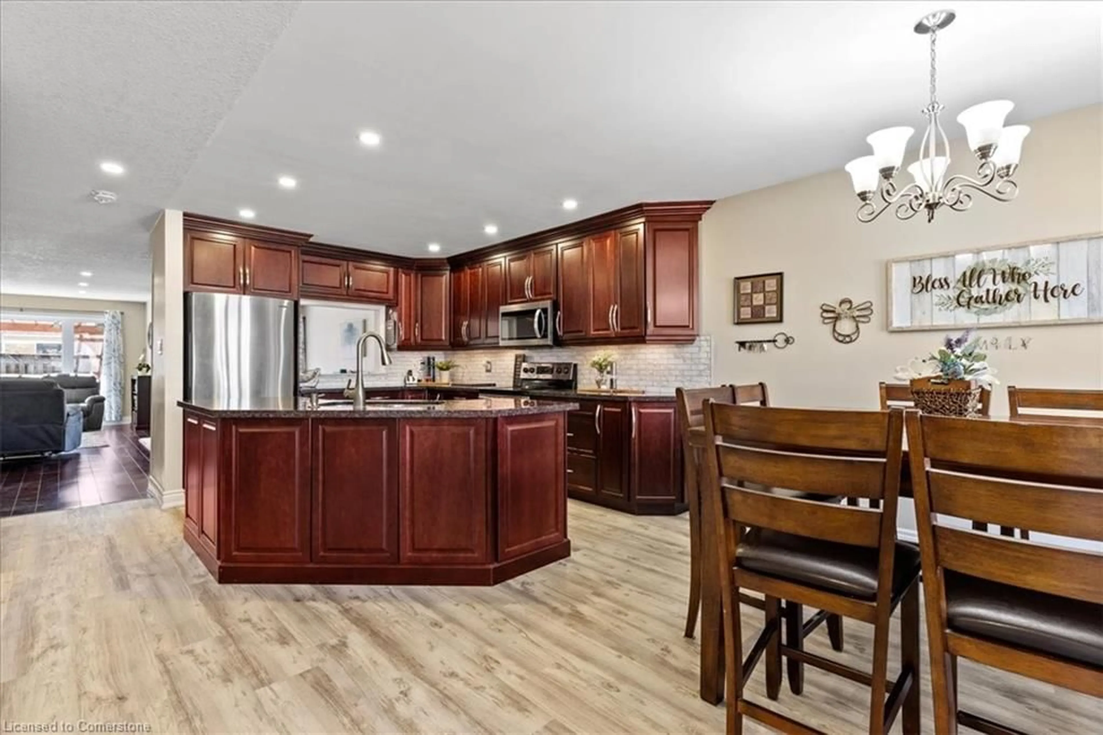 Open concept kitchen, wood/laminate floor for 125 Blackburn Dr, Brantford Ontario N3T 6S2