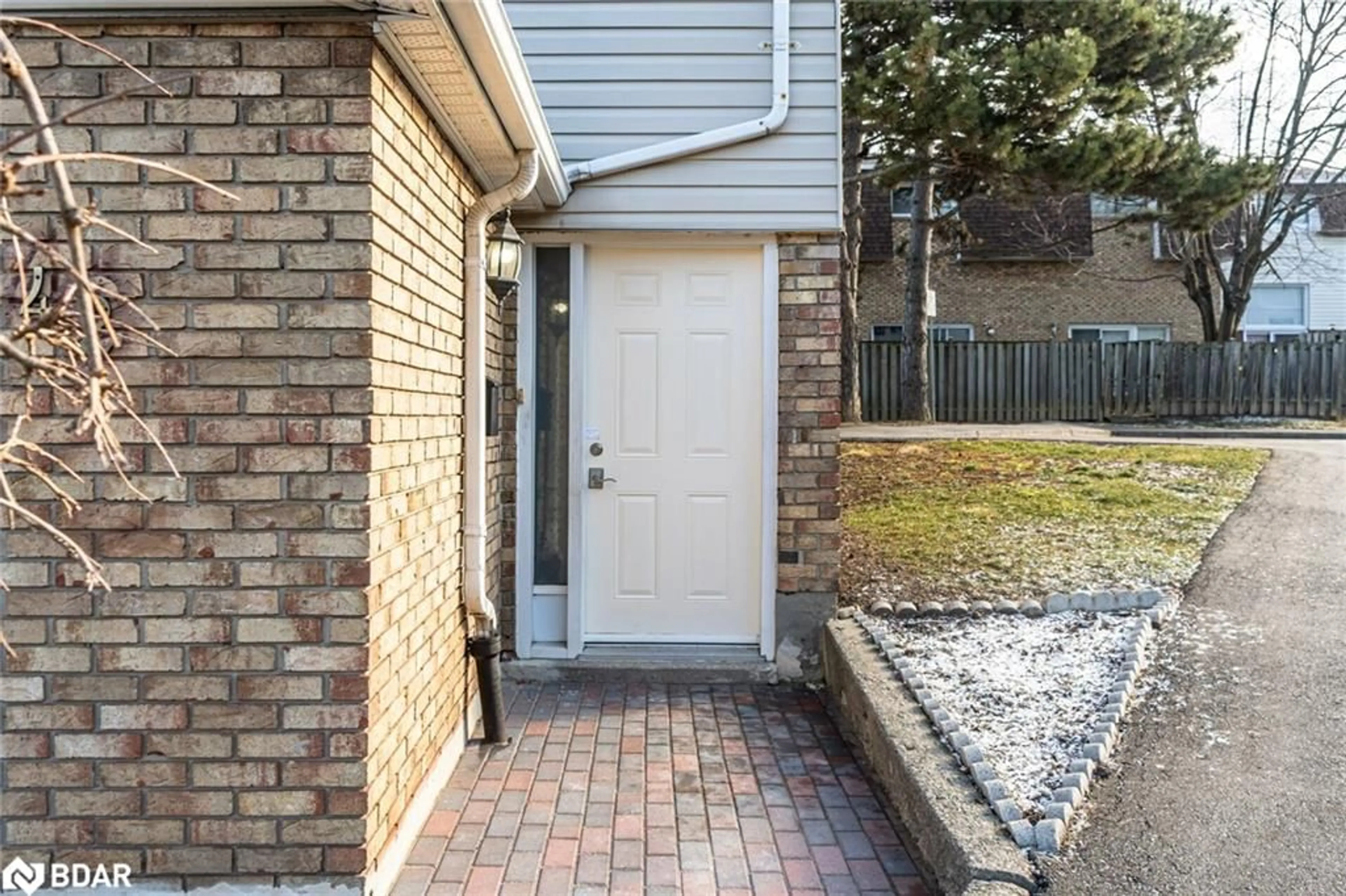 Home with brick exterior material, street for 11 Harrisford St #42, Hamilton Ontario L8K 8L7