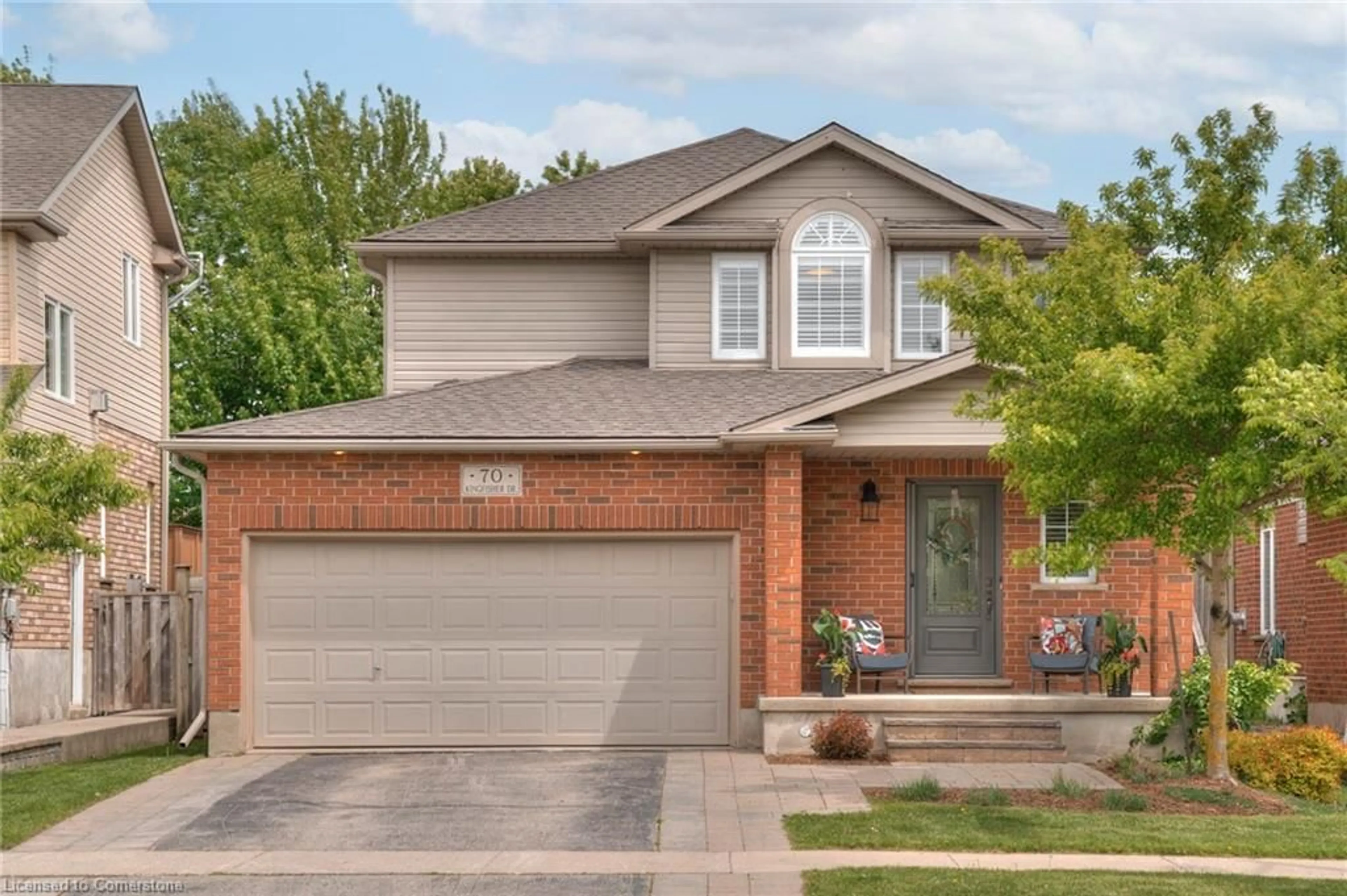 Home with brick exterior material, street for 70 Kingfisher Dr, Elmira Ontario N3B 4M4