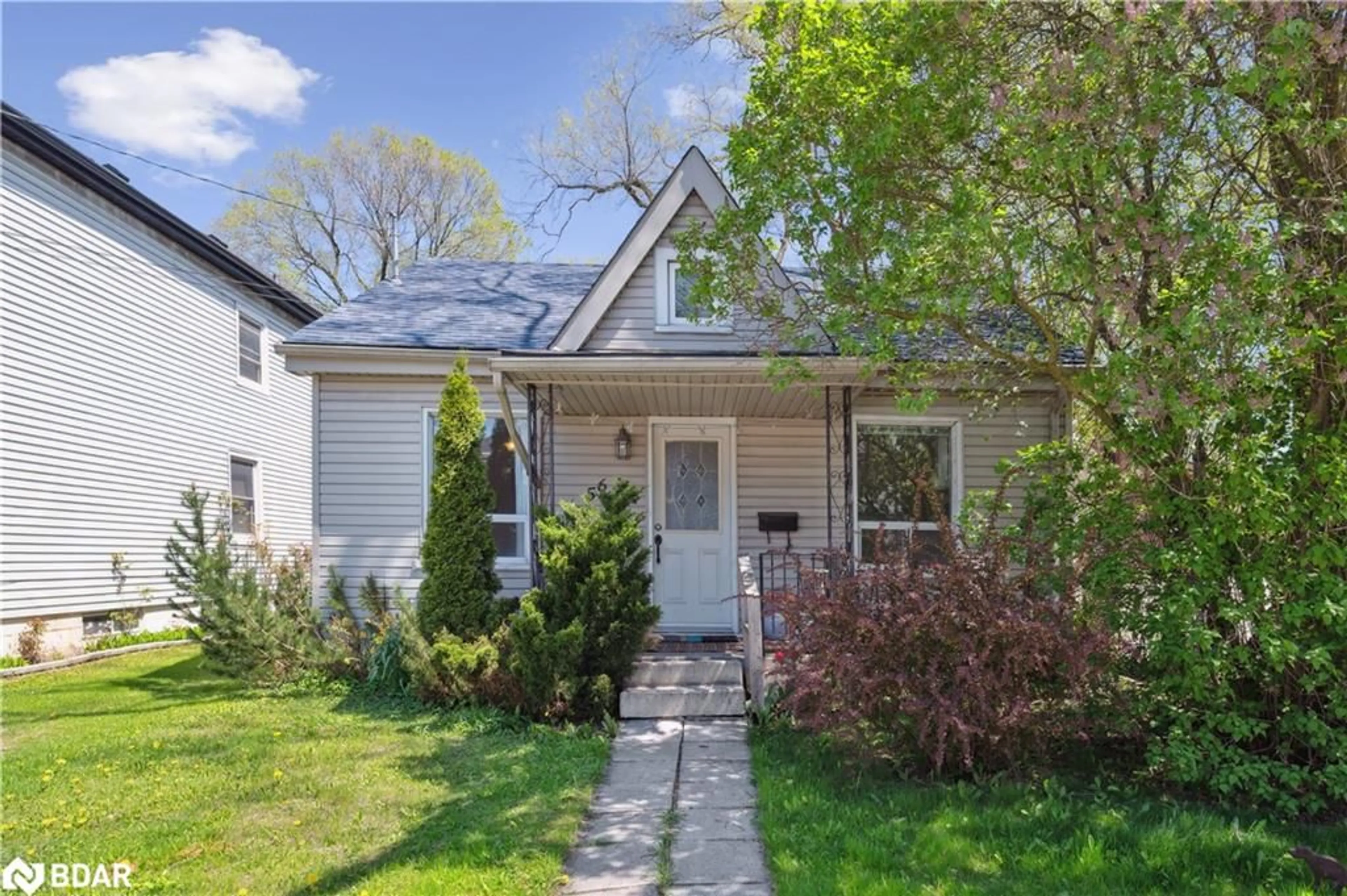 Home with vinyl exterior material, street for 56 Breadalbane St, Hamilton Ontario L8R 3G1