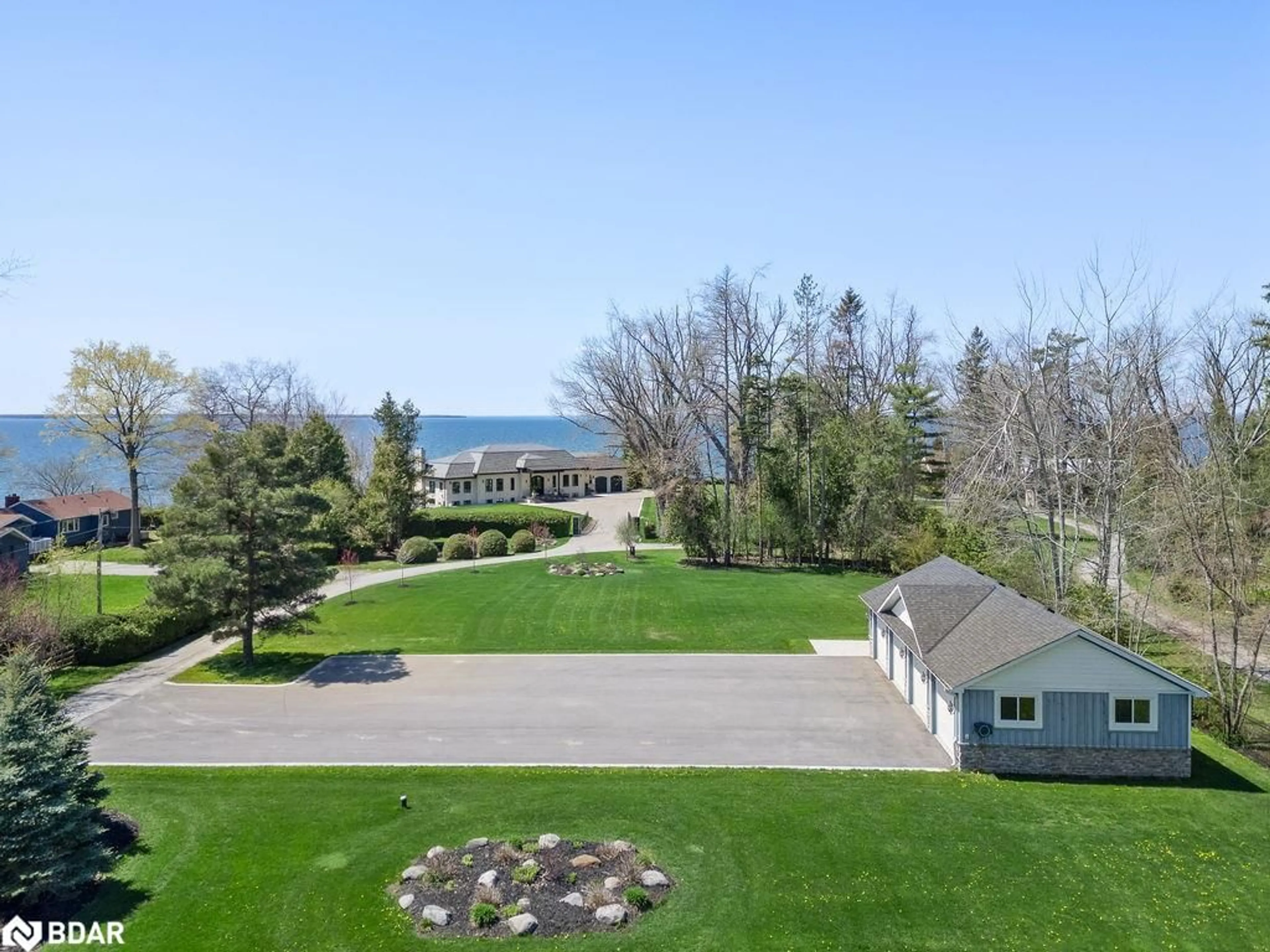 A pic from outside/outdoor area/front of a property/back of a property/a pic from drone, water/lake/river/ocean view for 16 Garden Gate, Beaverton Ontario L0K 1A0