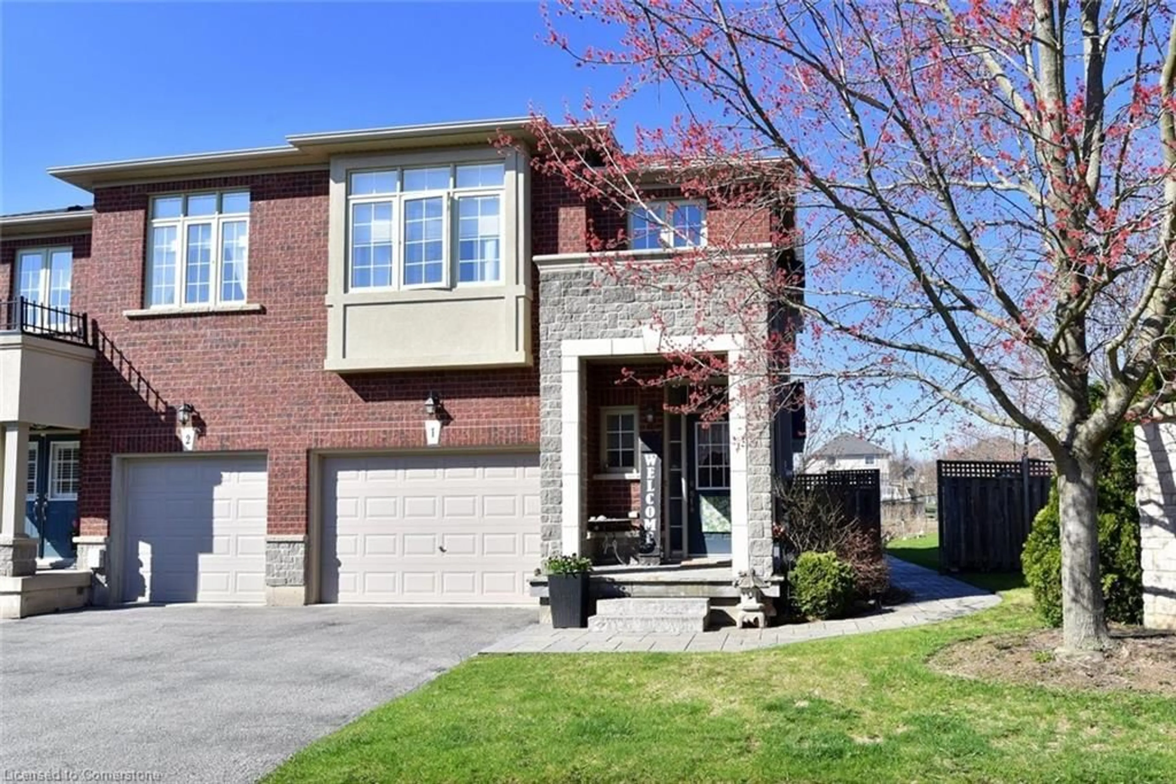 Home with brick exterior material, street for 99 Panabaker Drive Dr #1, Hamilton Ontario L9G 0A3