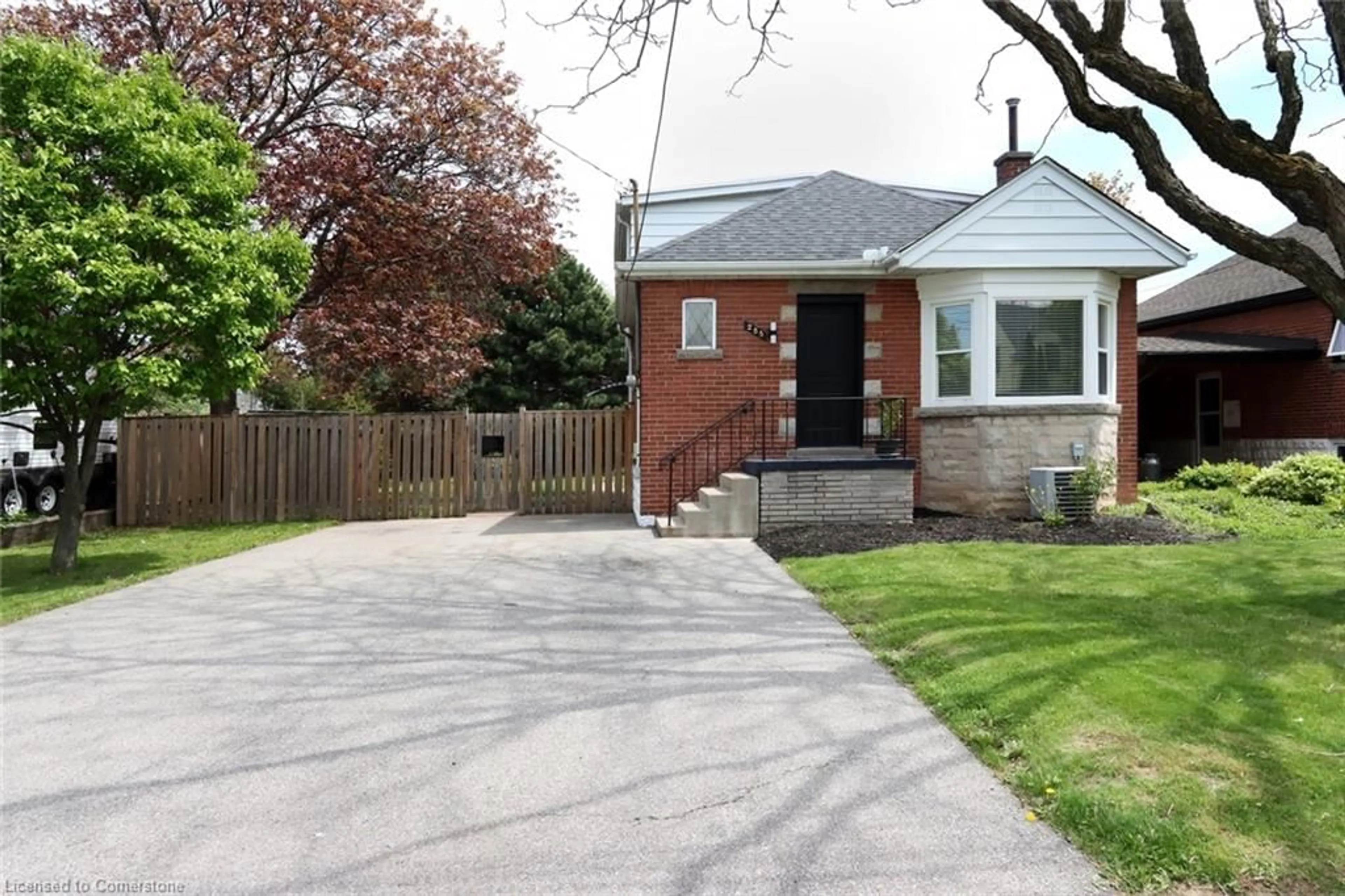 Home with brick exterior material, street for 255 East 11th St, Hamilton Ontario L9A 3T8