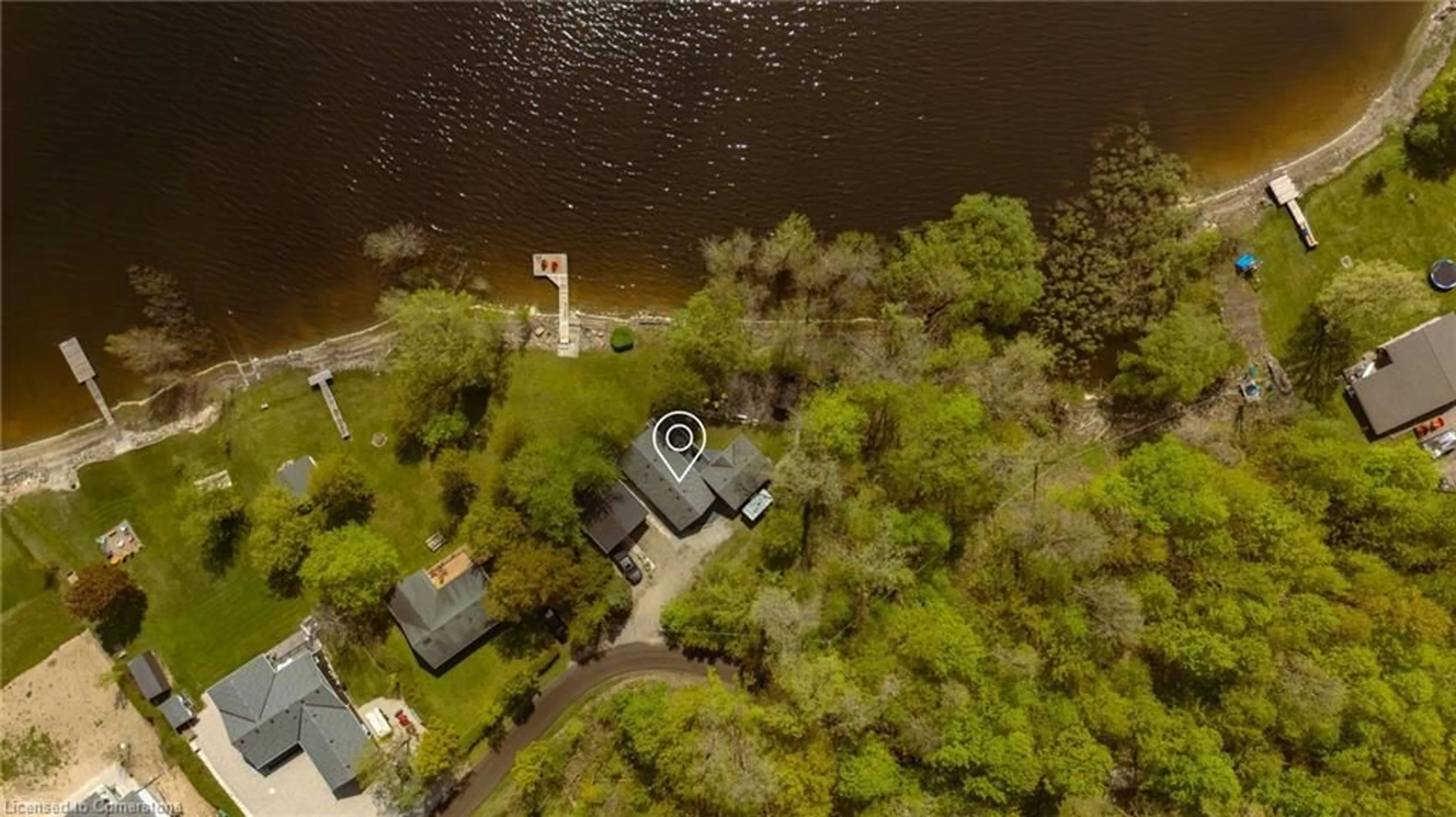 A pic from outside/outdoor area/front of a property/back of a property/a pic from drone, water/lake/river/ocean view for 1001 Road 10 W Rd, Conestoga Lake Ontario N0G 1P0