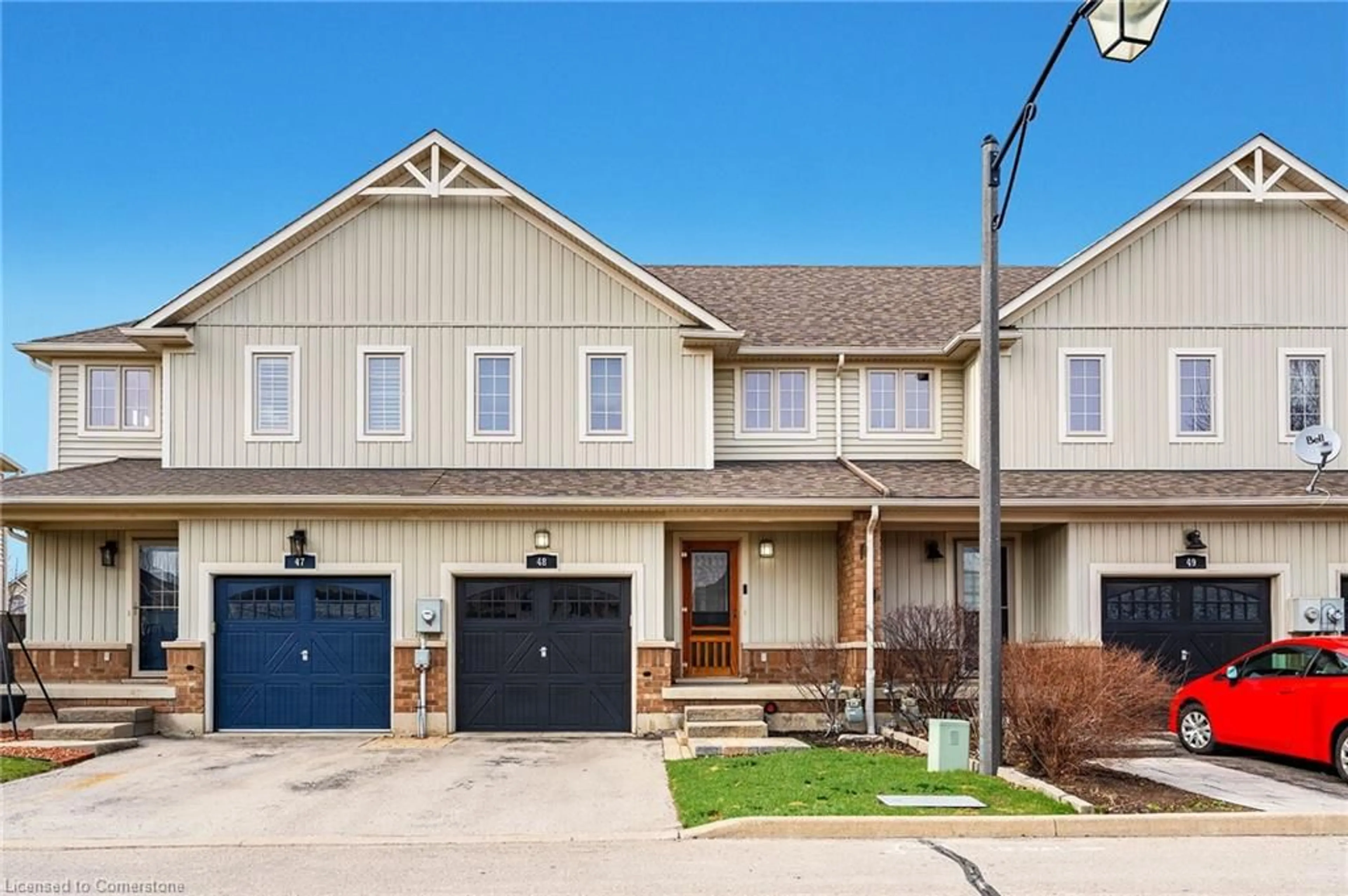 Home with brick exterior material, street for 222 Fall Fair Way #48, Binbrook Ontario L0R 1C0