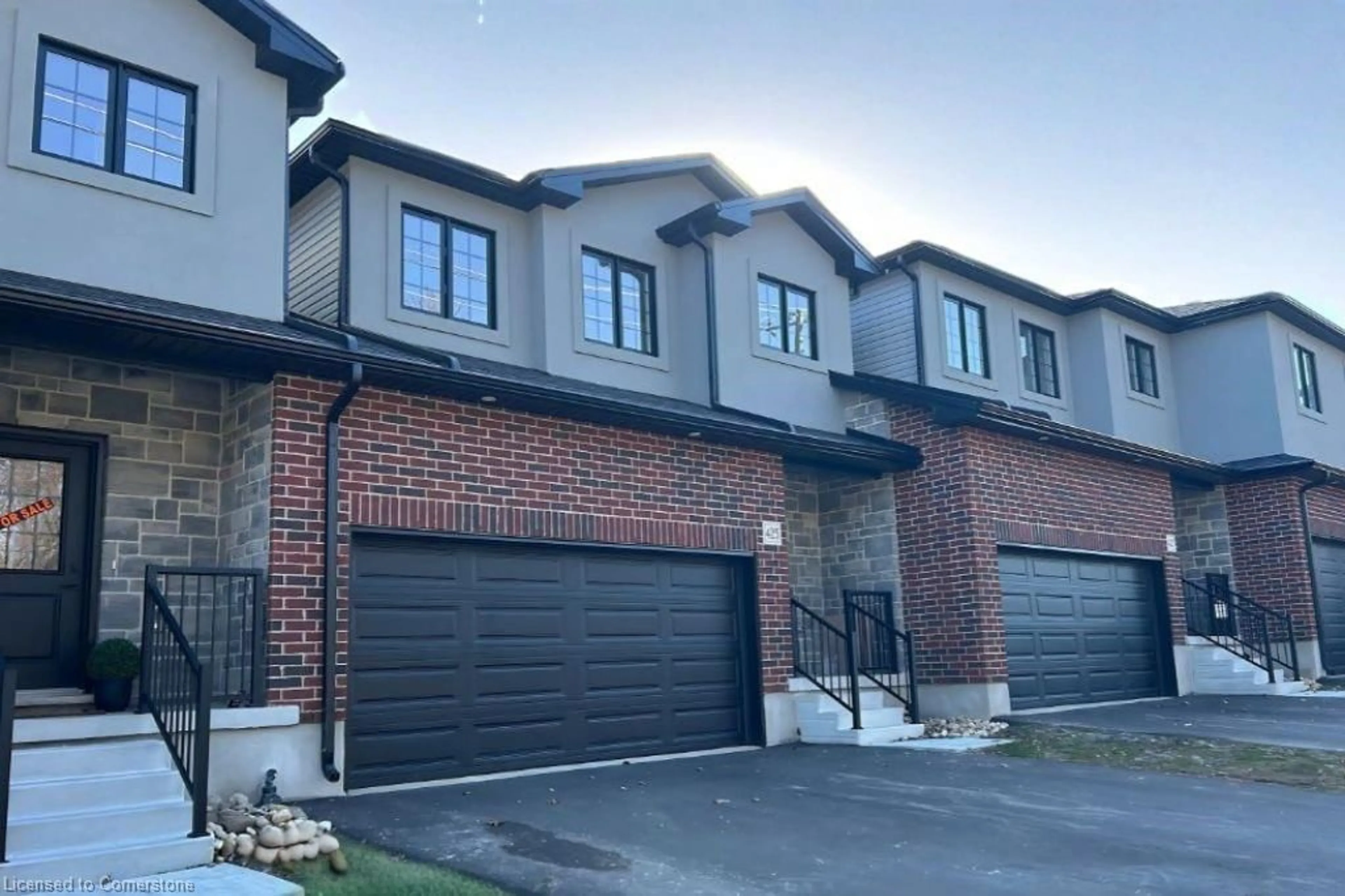 Home with brick exterior material, street for 423 Woolwich St, Waterloo Ontario N2K 0E8