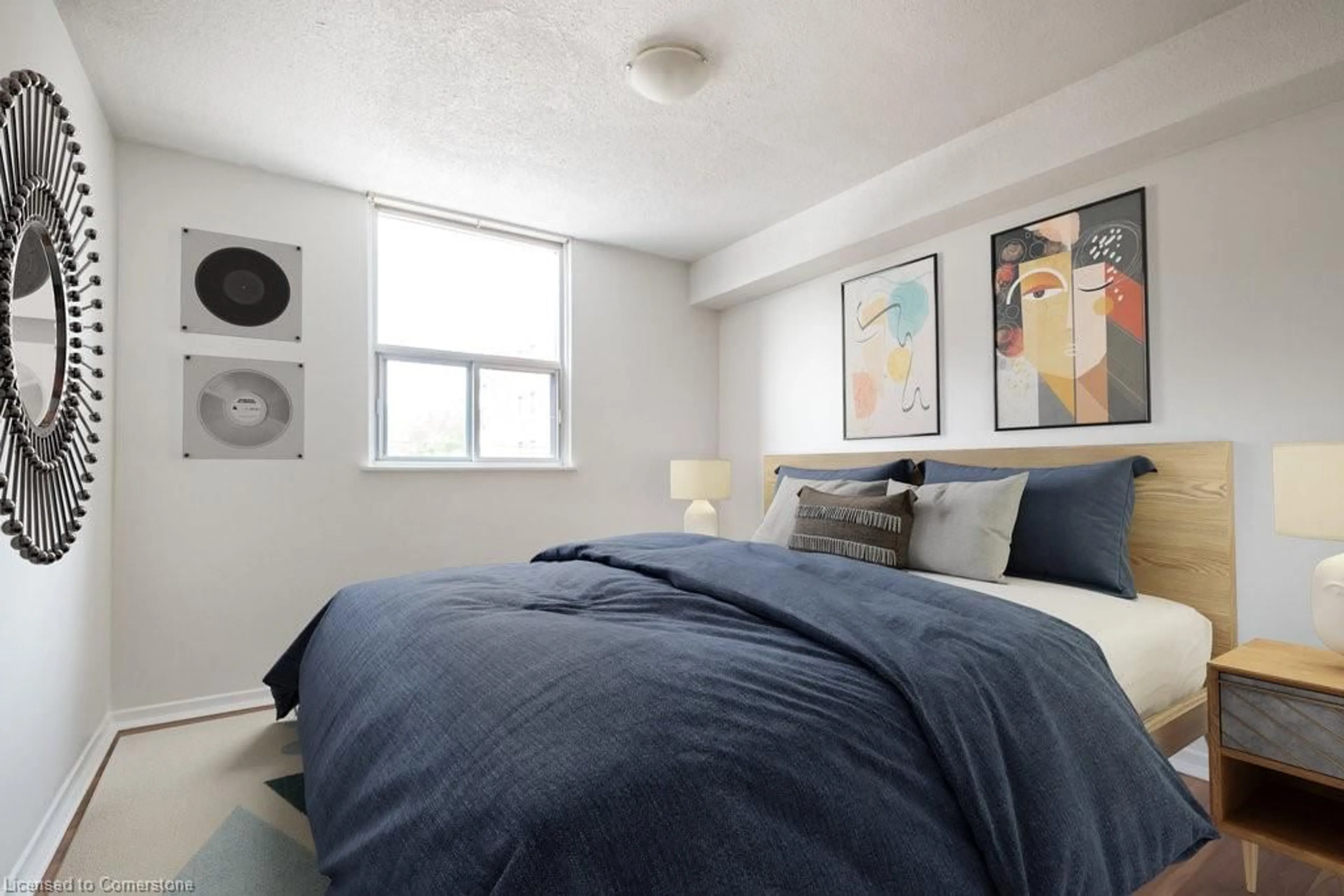 Bedroom with bed, carpet floor for 23 Main St #205, Dundas Ontario L9H 2P7