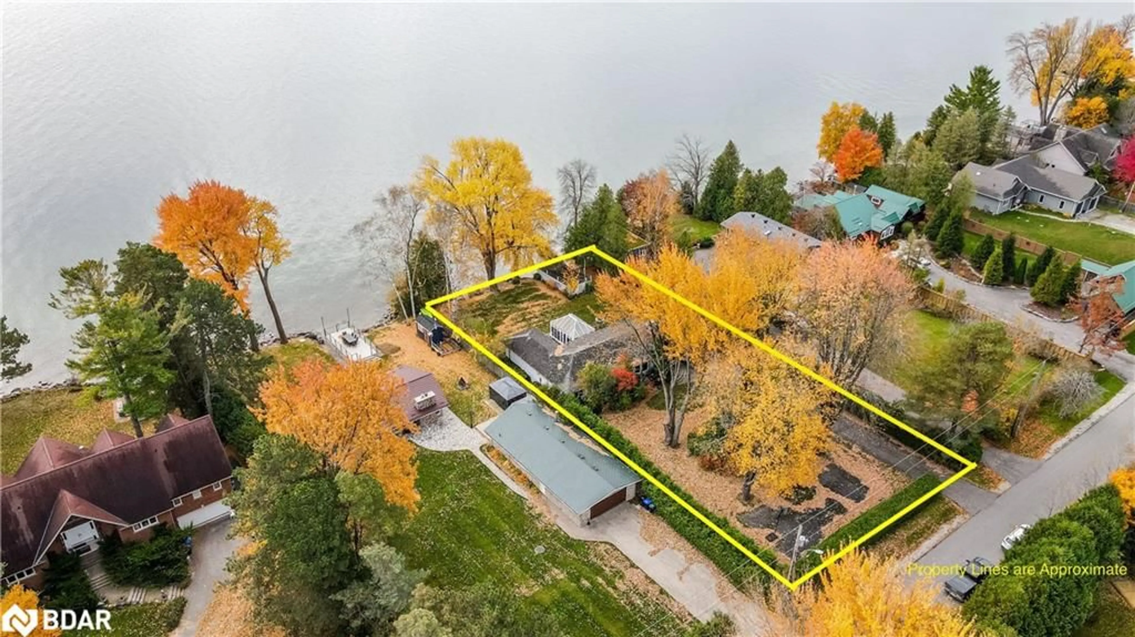 A pic from outside/outdoor area/front of a property/back of a property/a pic from drone, water/lake/river/ocean view for 155 Parkside Dr Dr, Oro-Medonte Ontario L3V 0K8