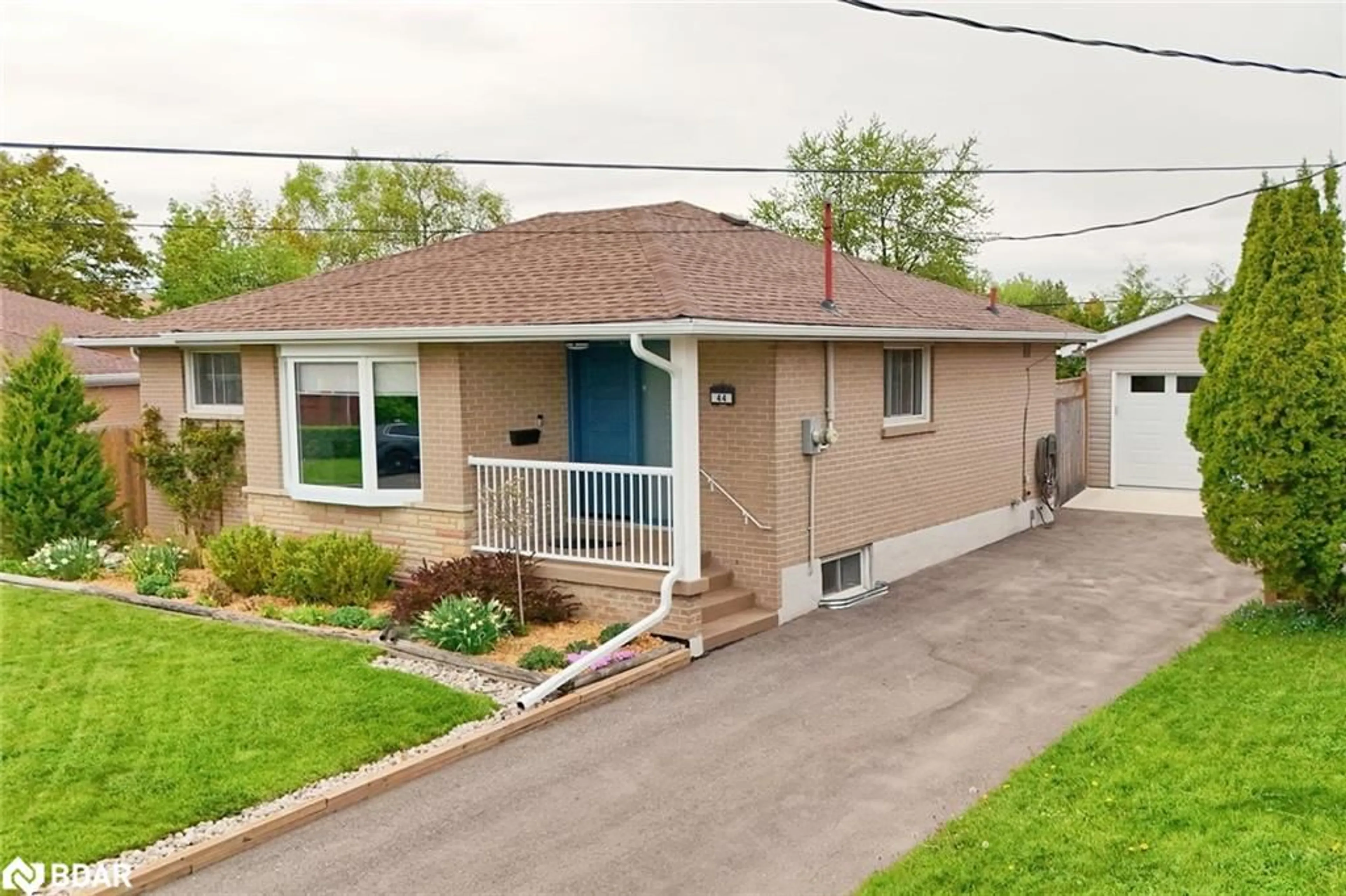 Home with vinyl exterior material, street for 44 Moultrey Cres, Georgetown Ontario L7G 4N5