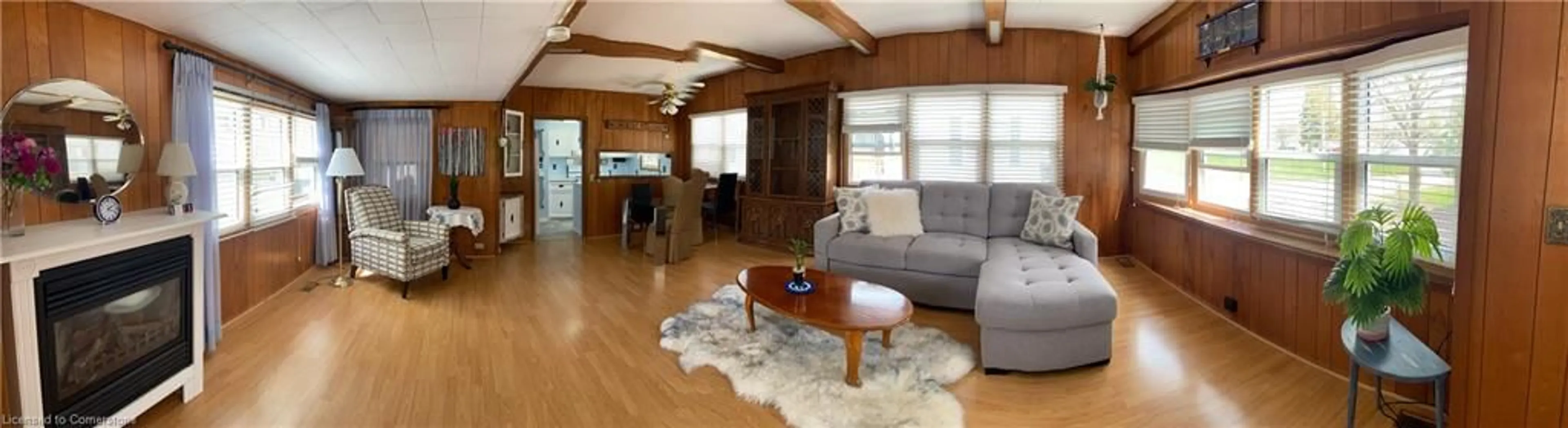 Living room with furniture, wood/laminate floor for 12 Macpherson Cres, Flamborough Ontario N0B 2J0