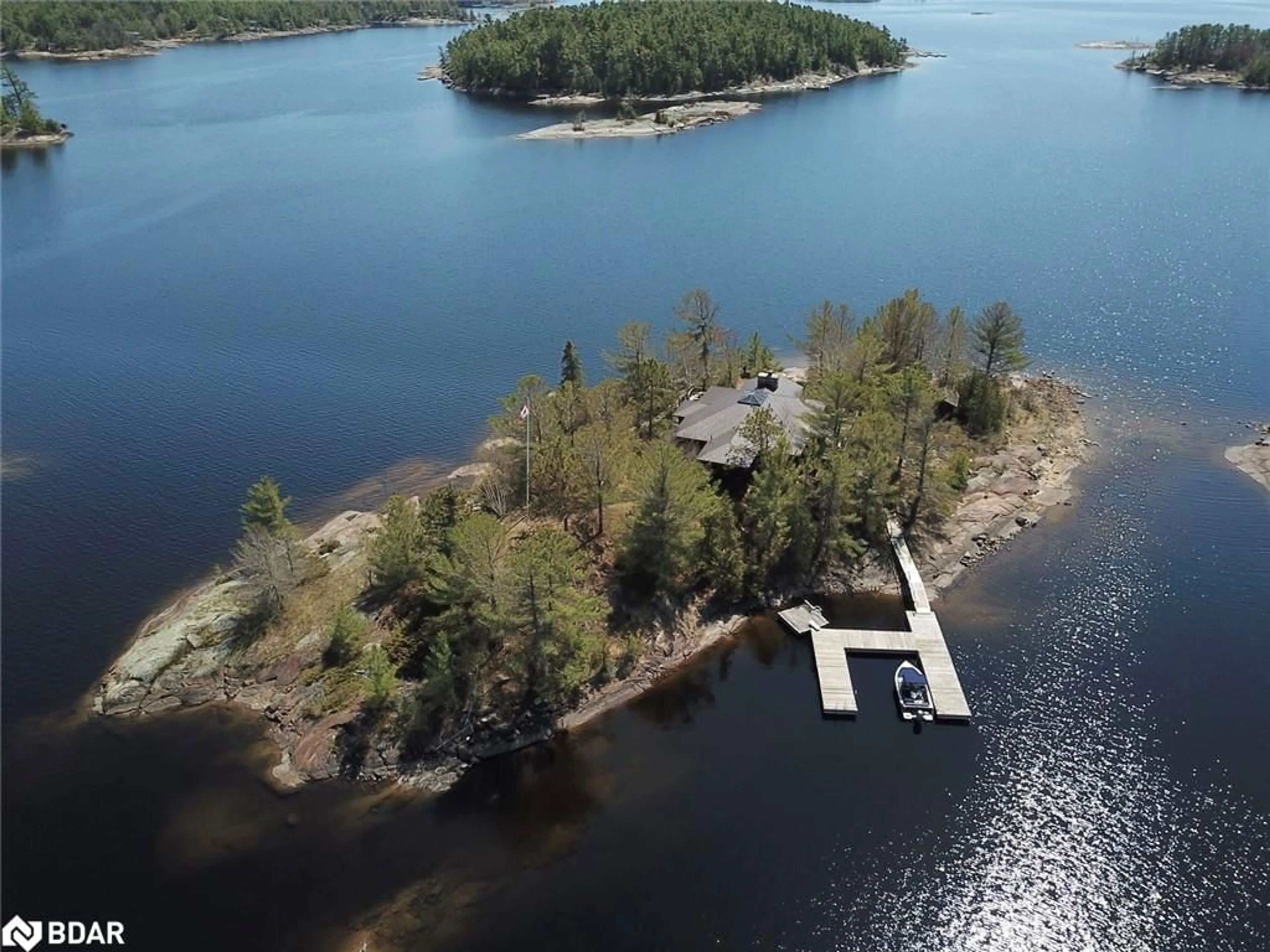 A pic from outside/outdoor area/front of a property/back of a property/a pic from drone, water/lake/river/ocean view for 1 A52 Island, Pointe au Baril Ontario P0G 1K0